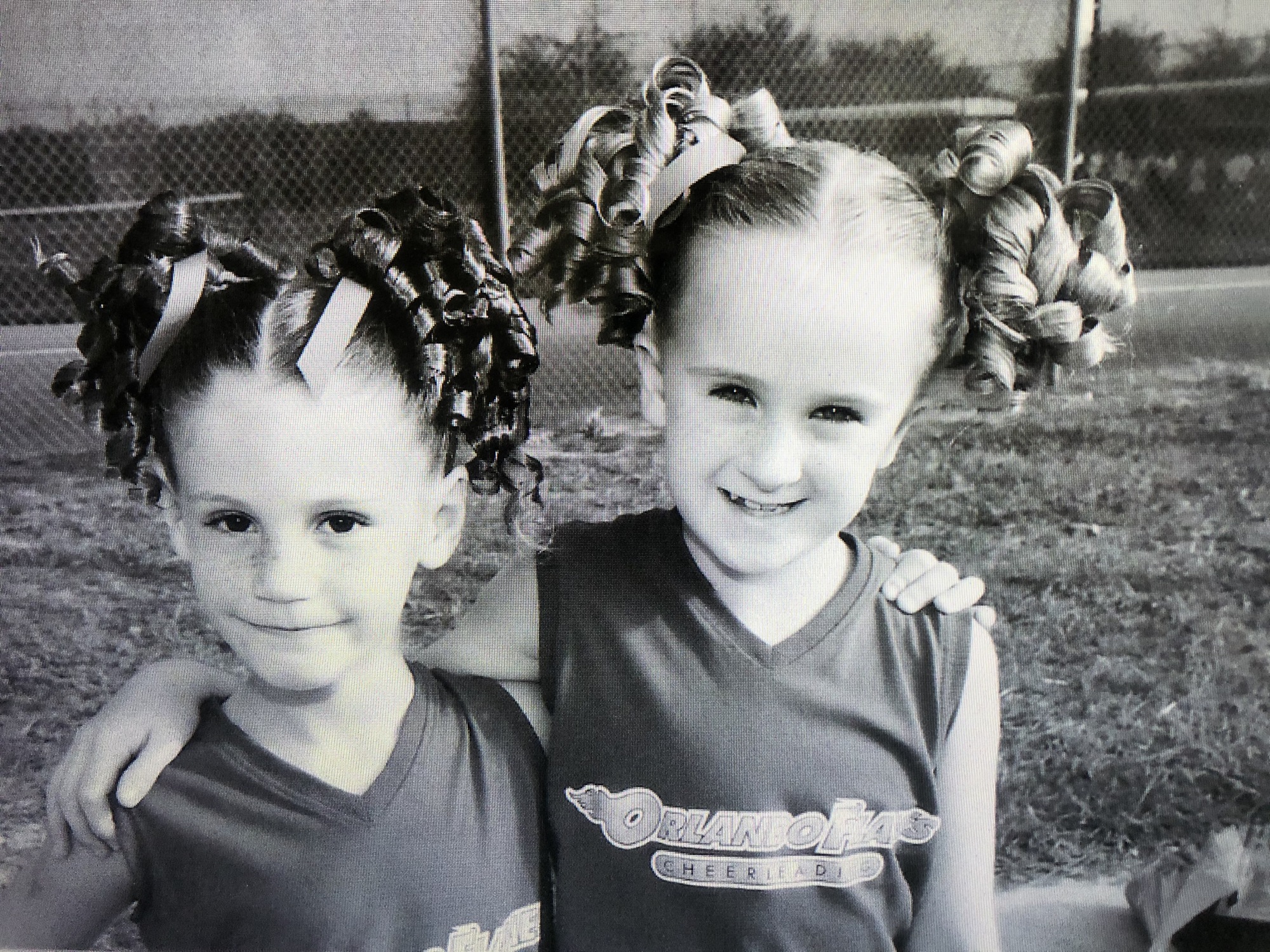 Raygan Cristello, left, and Allison Couch cheered for the Orlando Flames.