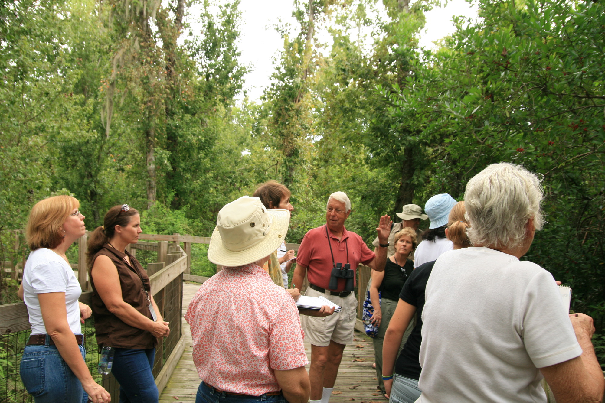 Jim Thomas teaches from the Oakland Nature Preserve boardwalk.