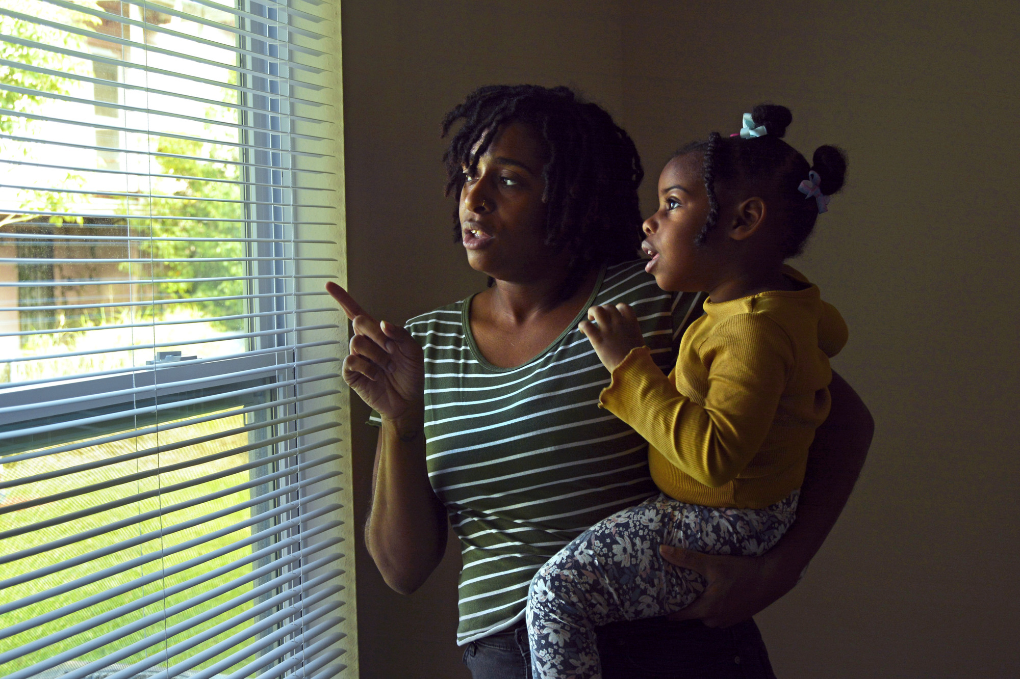 Natalie Kinscy and her daughter, Amiyah, face a brighter future as they settle into their new Habitat for Humanity home.