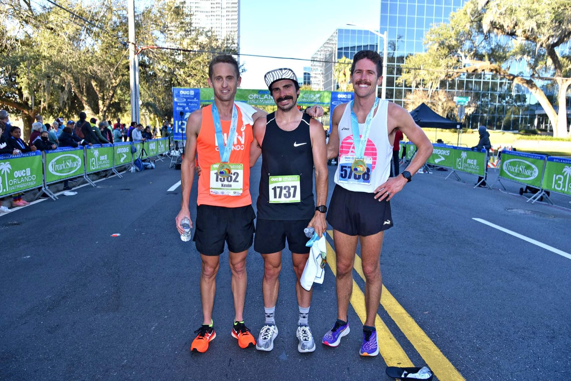 The Top 3 men in the OUC Orlando Half-Marathon were Kevin Collington, left, second place; Jean-Philippe Thibodeau, third; and Joe Farrand, first.