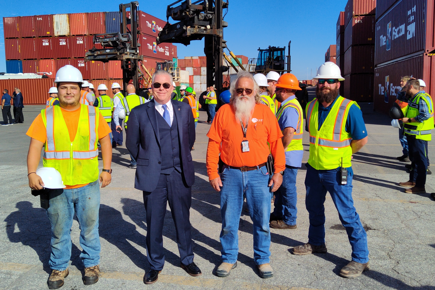 AGX Freight Chief Operating Officer Ike Sherlock, second from left, with workers at JaxPort.