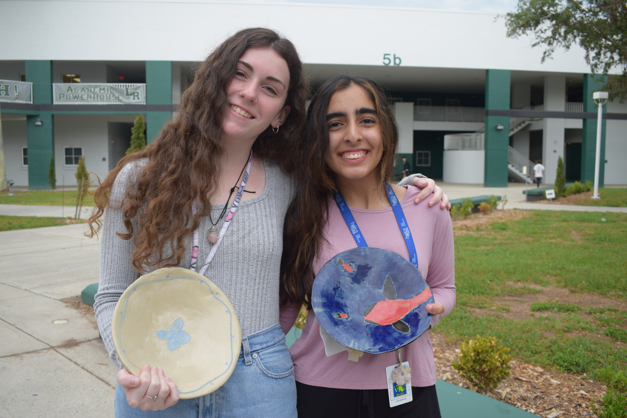 Sophomores Ainsley Owens and Ramzia Sorathia say they love being able to put their personal touch on the bowls they sold or donated to raise money for Meals on Wheels Plus of Manatee.