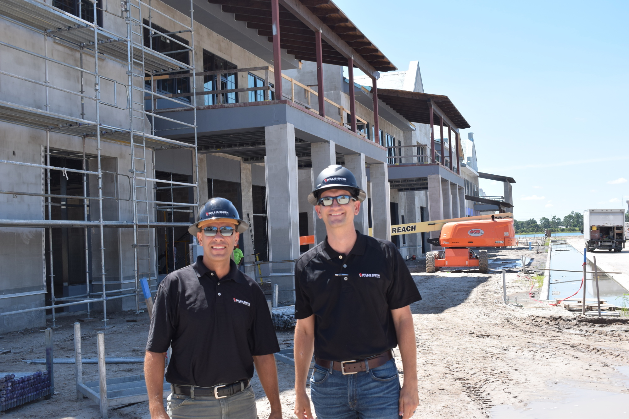 Willis Smith's Angel Ortiz and Nathan Carr during construction of Waterside Place in 2020.