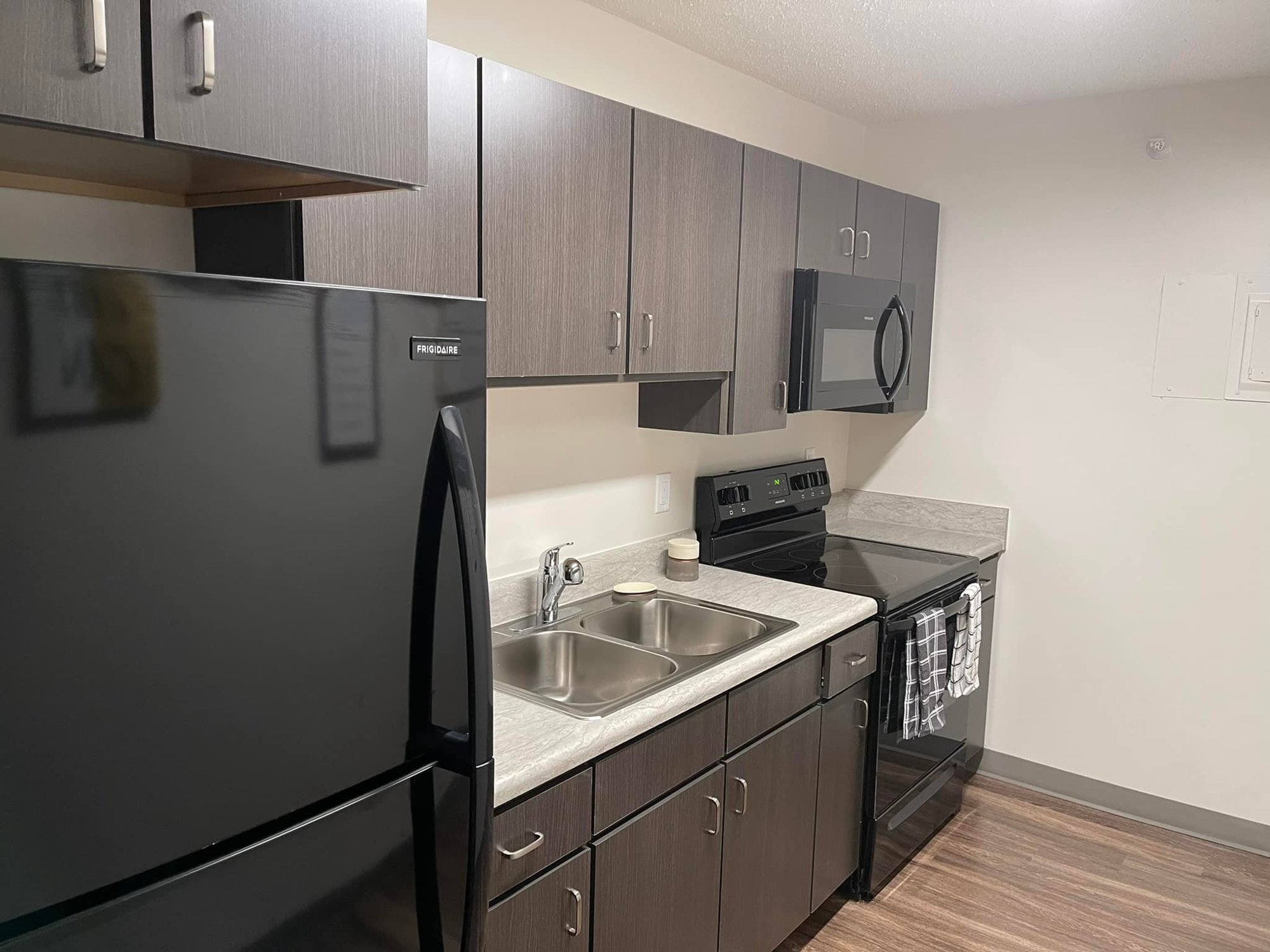 The kitchens in the 208 apartments at Centennial Towers were renovated with new cabinets and appliances.