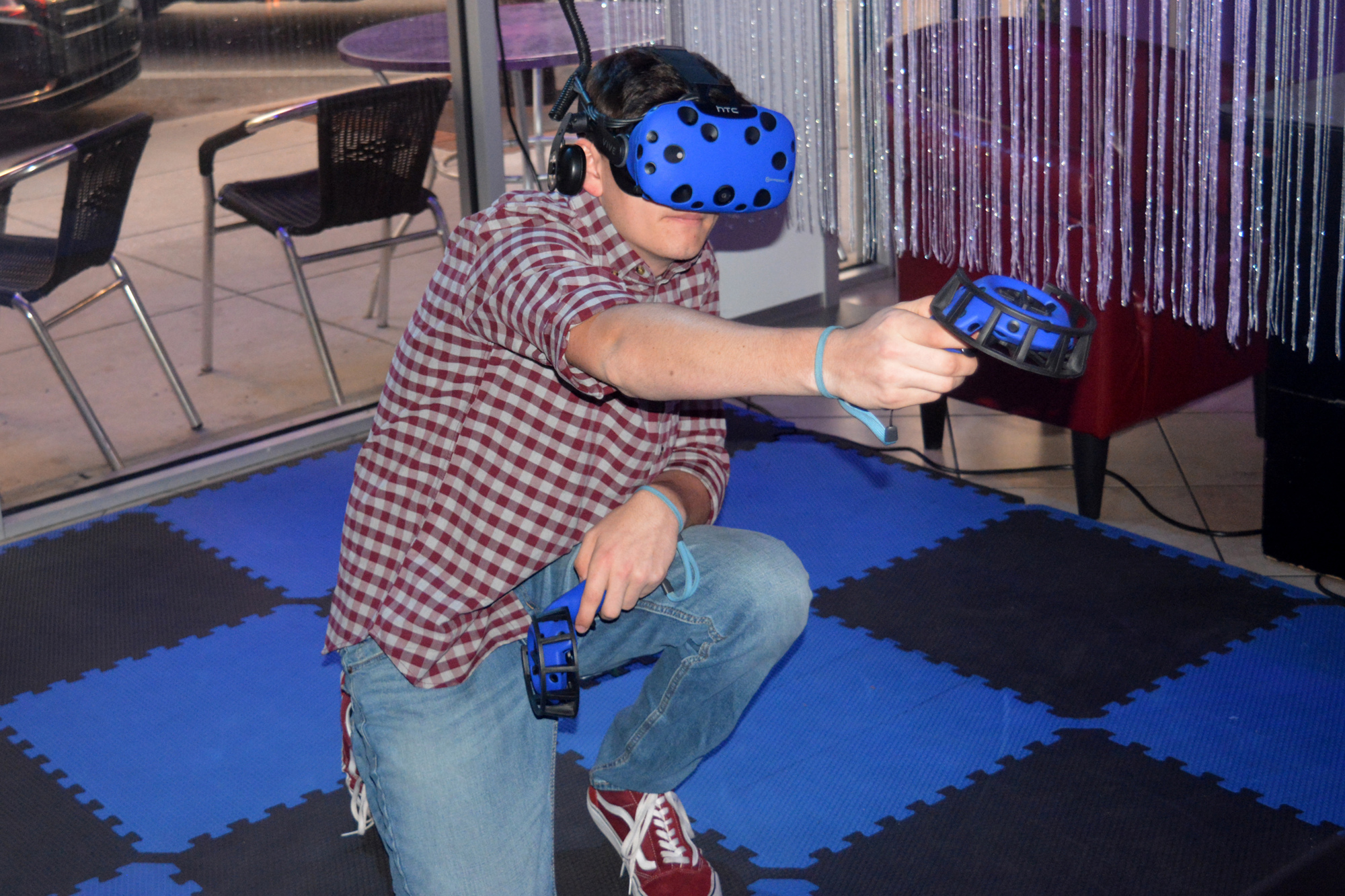 Michael Durham plays tests out the HTC Vive virtual reality headsets at Mysterium Escape Rooms and VR — previous called Escape Reality Downtown — in 2019.