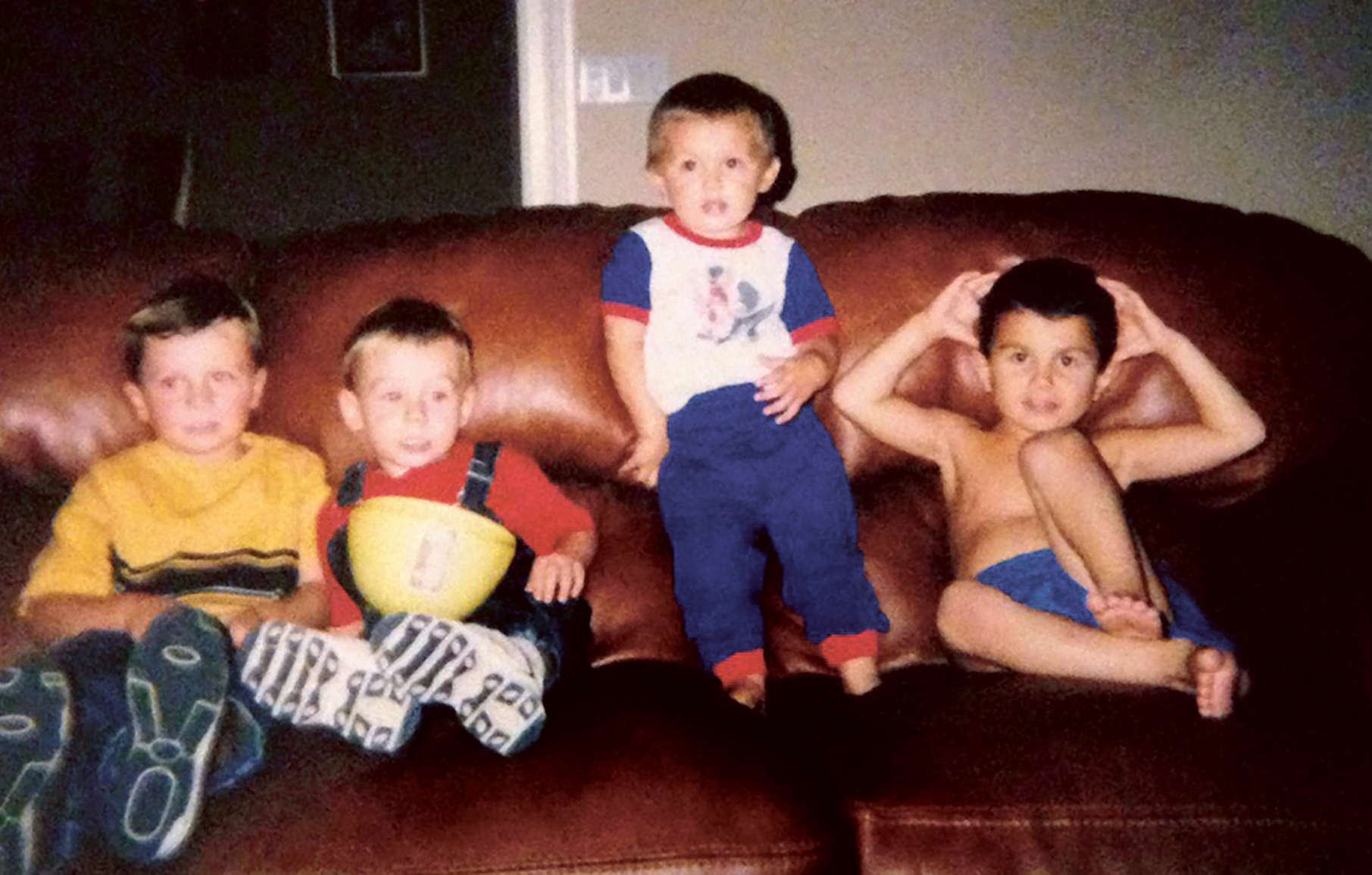 Daniel Luette, left, Robert Luette, Sam Malaussena and Zach Malaussena were hanging out on the couch as kids long before they were teammates at West Orange High. Courtesy photo.