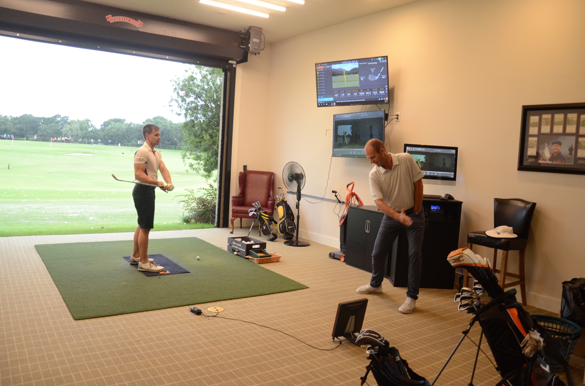 Matthew Borchert gives instruction at Isleworth Golf & Country Club's training facility.