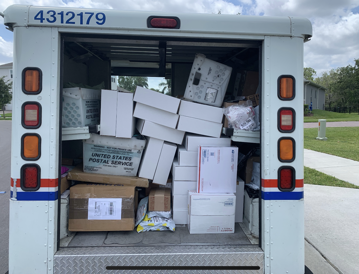 On Tim Rice’s last day of work, he snapped a photo of his mail truck, which had more packages than letters.