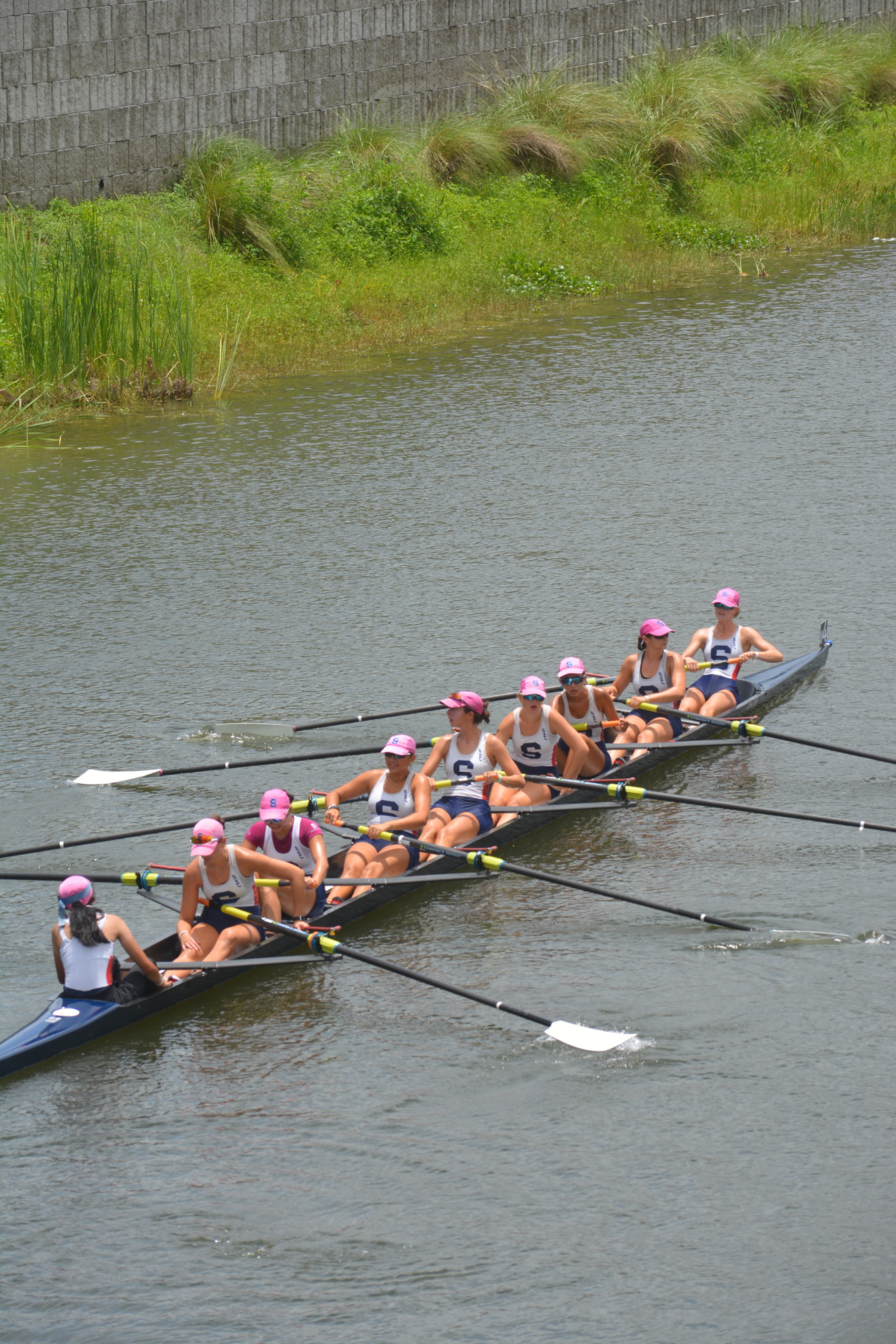 Sophia Stock (right) and her Women's Youth Second Varsity 8+ teammates row back to the dock after finishing  fourth (7:04.09) in the B Final at the 2022 USRowing Youth National Championships.