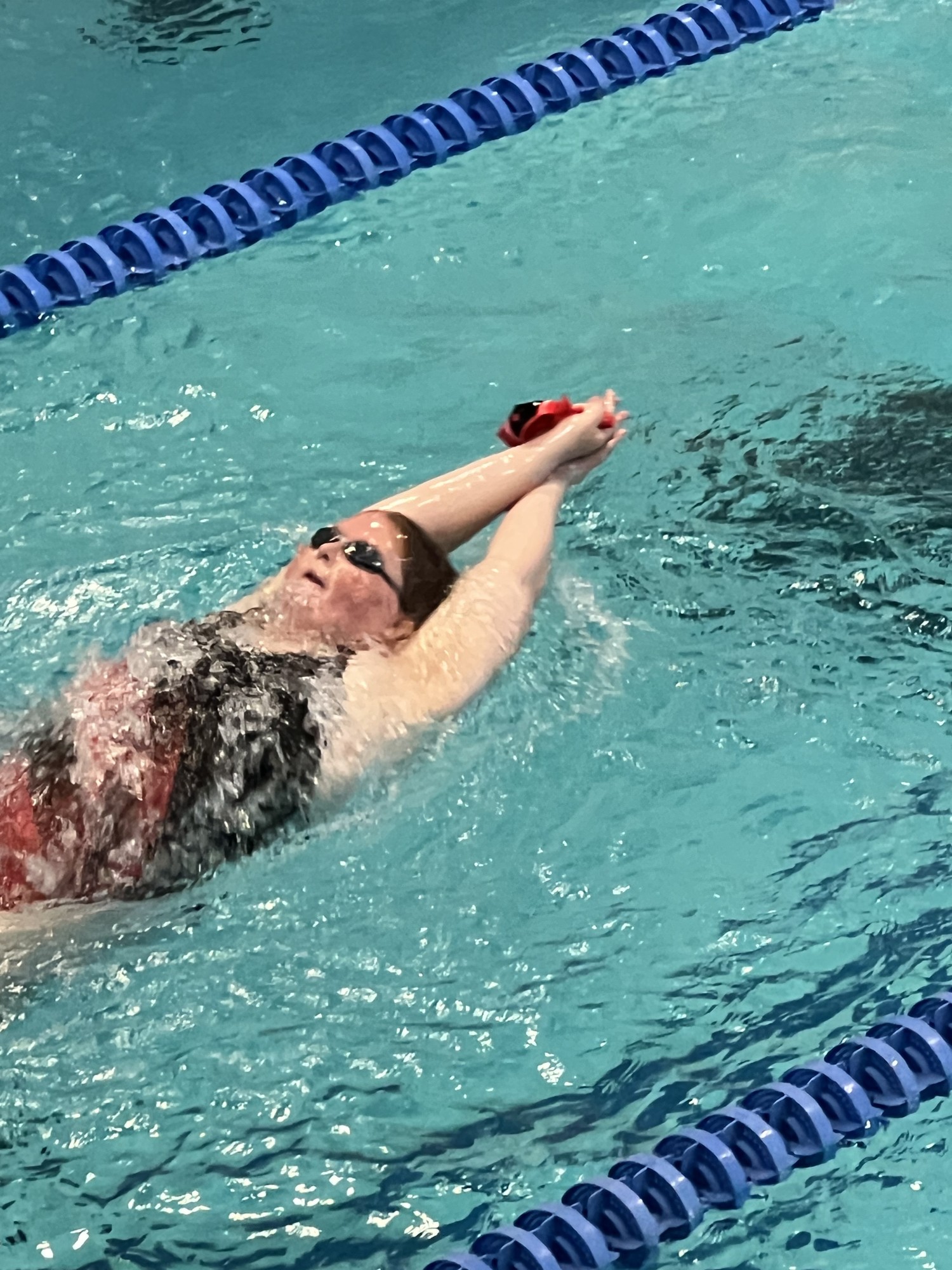Mary Russell, 24, swims for gold in the 100 meter freestyle at the 2022 Special Olympics USA Games. Russell won the event in 1:30.34.  (Courtesy photo)
