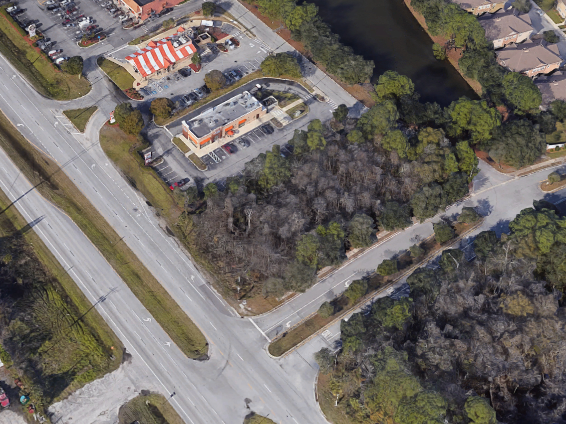 The site of a proposed Panera Bread at Philips Highway and Bonneval Road near Dunkin' and Whataburger.