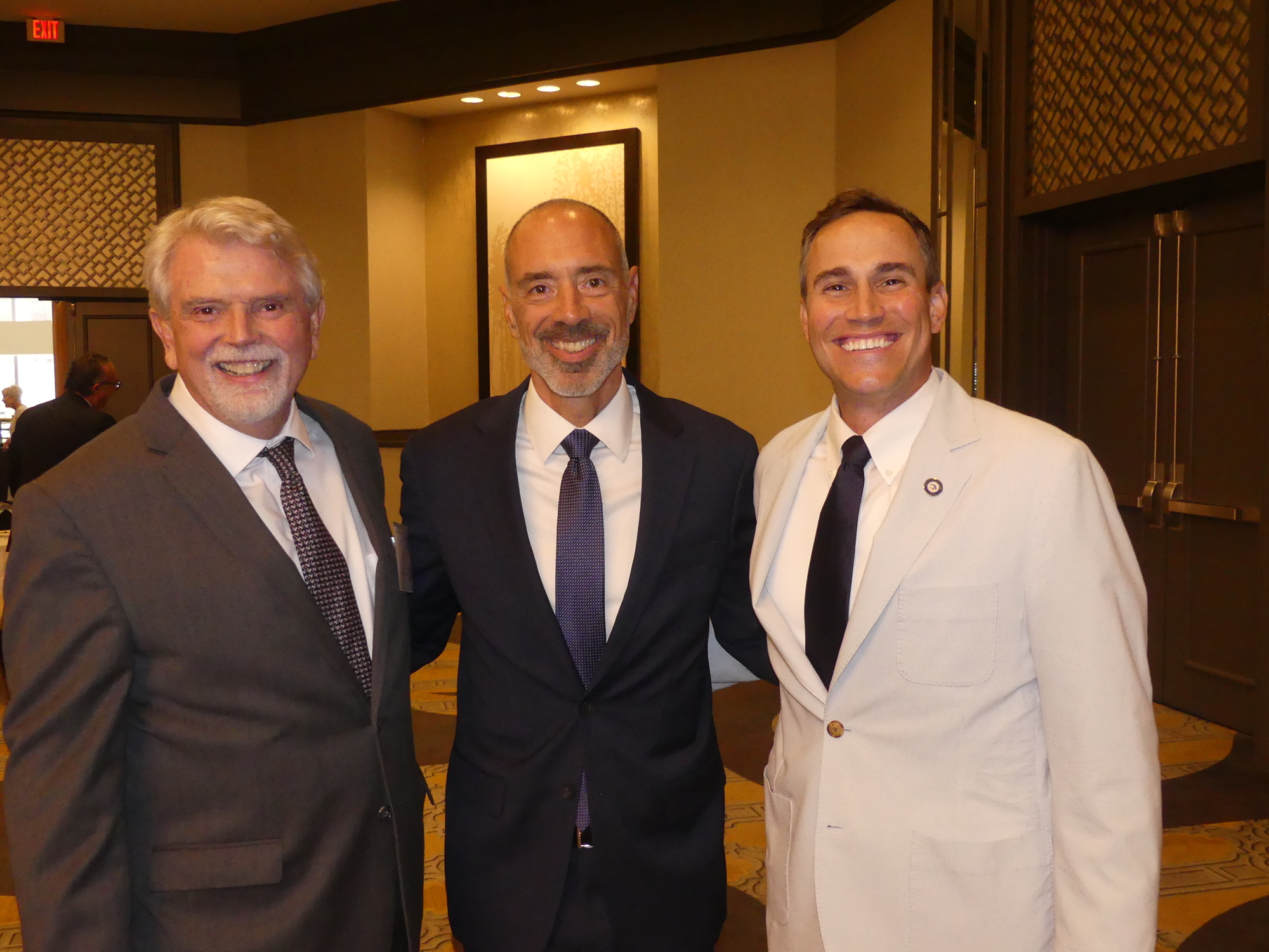 Fourth Judicial Circuit Chief Judge Mark Mahon, left, with state Supreme Court Justice Alan Lawson and Michael Fox Orr, 2021-22 president of the Jacksonville Bar Association.