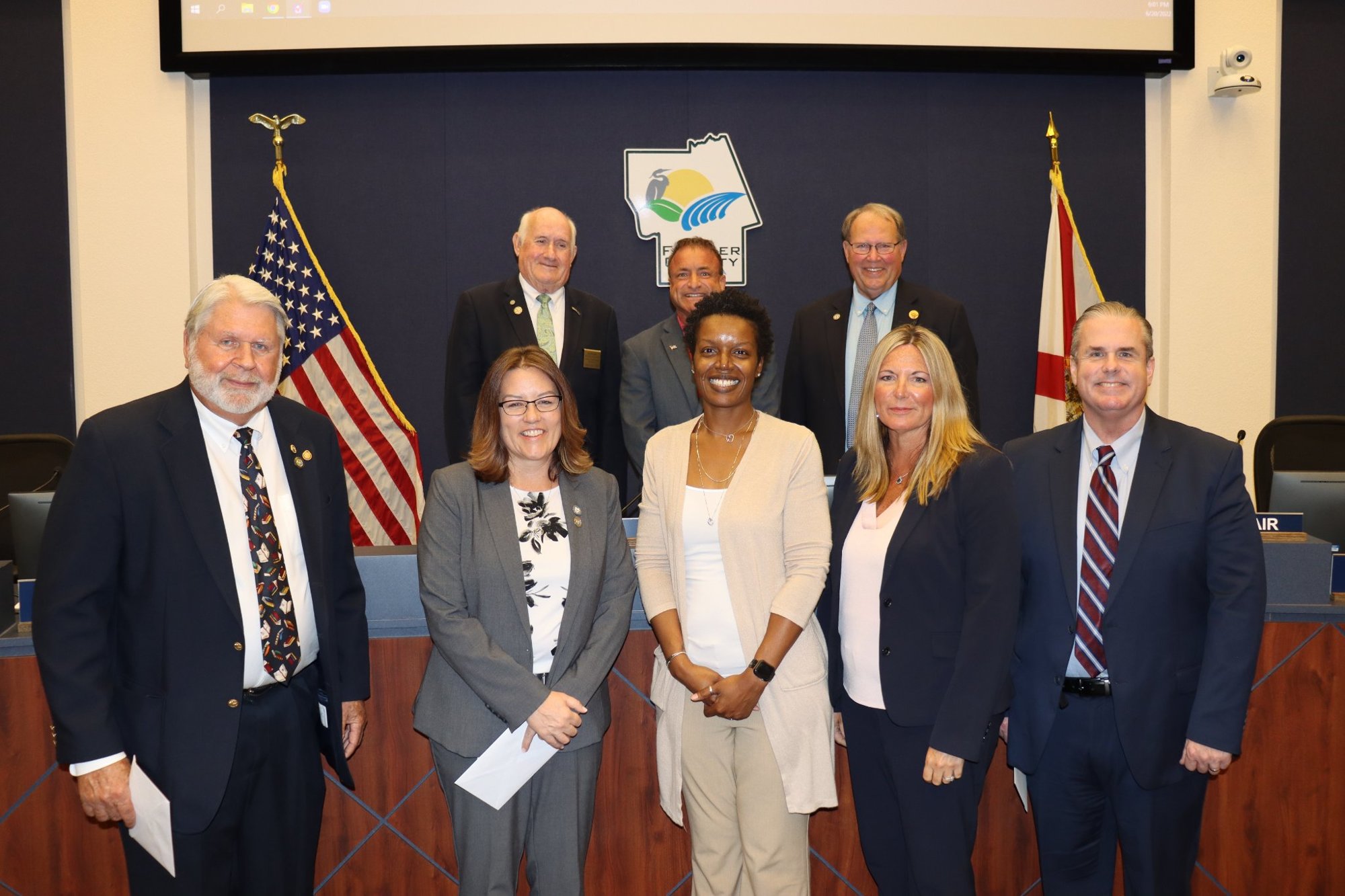 Class valedictorian and city of Bunnell Financial Services Coordinator Lakesha Byrd, center, with Leadership Academy instructors and local officials. Photo courtesy of Joe Saviak