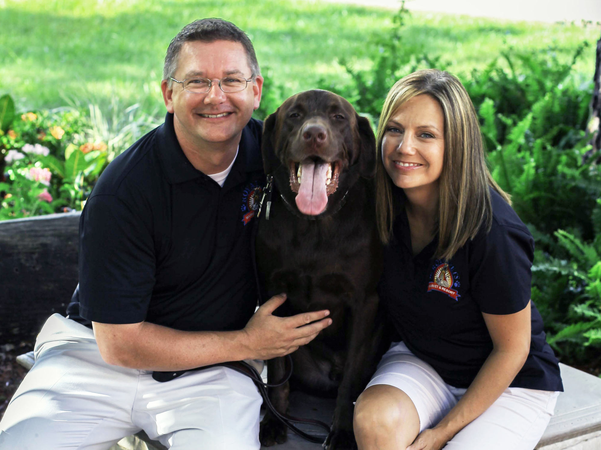 Courtesy. Royal Pets Chief Veterinary Officer Dr. Bryan McGoldrick with his wife, Kim, and their chocolate lab, Sam.