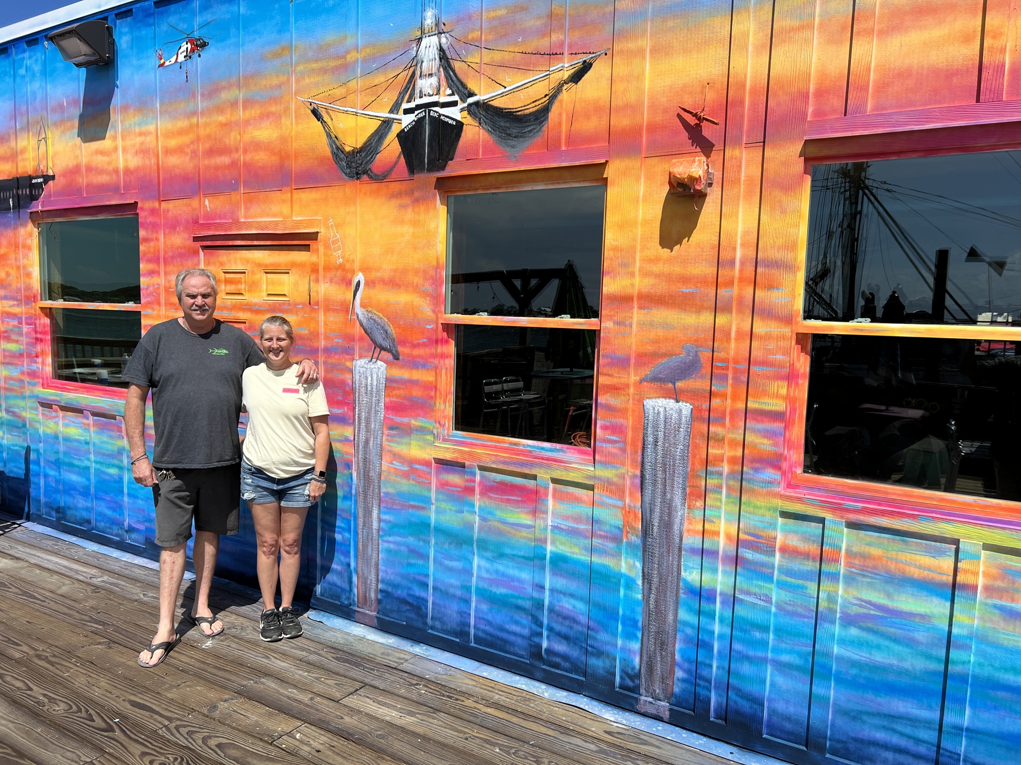 A mural depicting the Mayport fishing village is being painted by area artist Gary Mack.