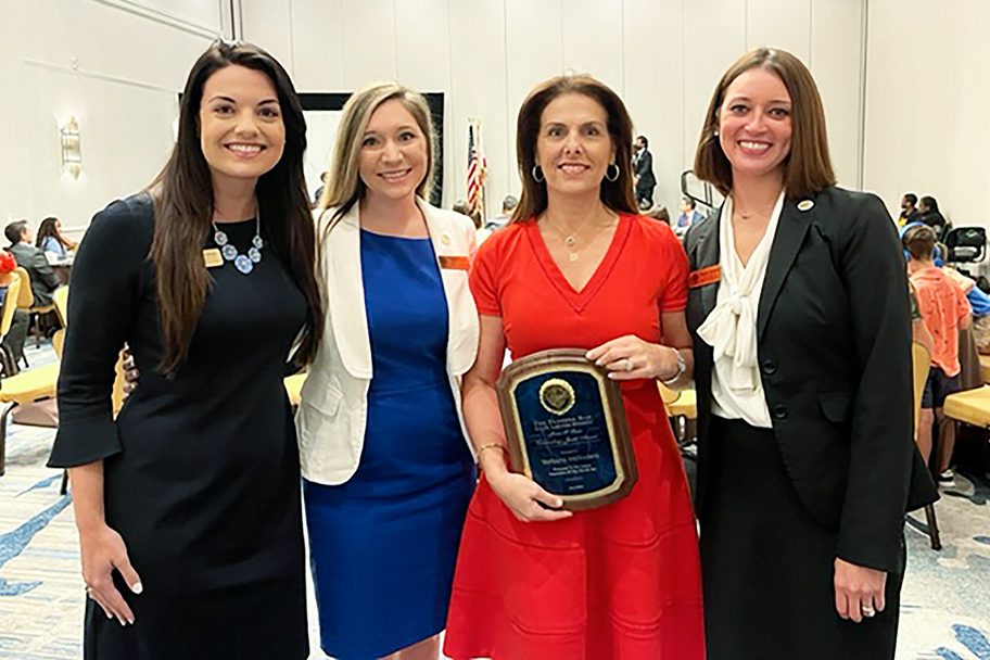 From left, The Florida Bar Young Lawyers Division 4th Circuit Governors Valeen Hyde and Sarah Morris; 4th Circuit Judge Tatiana Salvador, recipient of the YLD Jurist of the Year Award; and 4th Circuit Governor Ashlea Edwards.