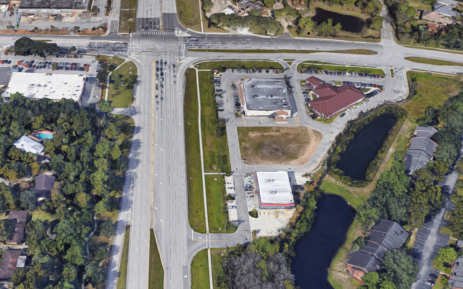 A Whataburger is planned on about 1 acre between Walgreens and AutoZone. (Google)