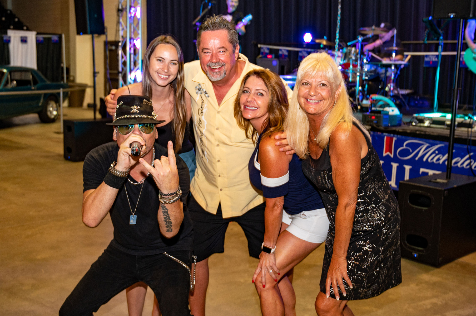 Hurricane Shane with Lisa Baer, Simon Williams, Dee Babcock and Lucy Nicandri at the Waves and Wheels party on July 9. (Photo courtesy of Lori Sax)