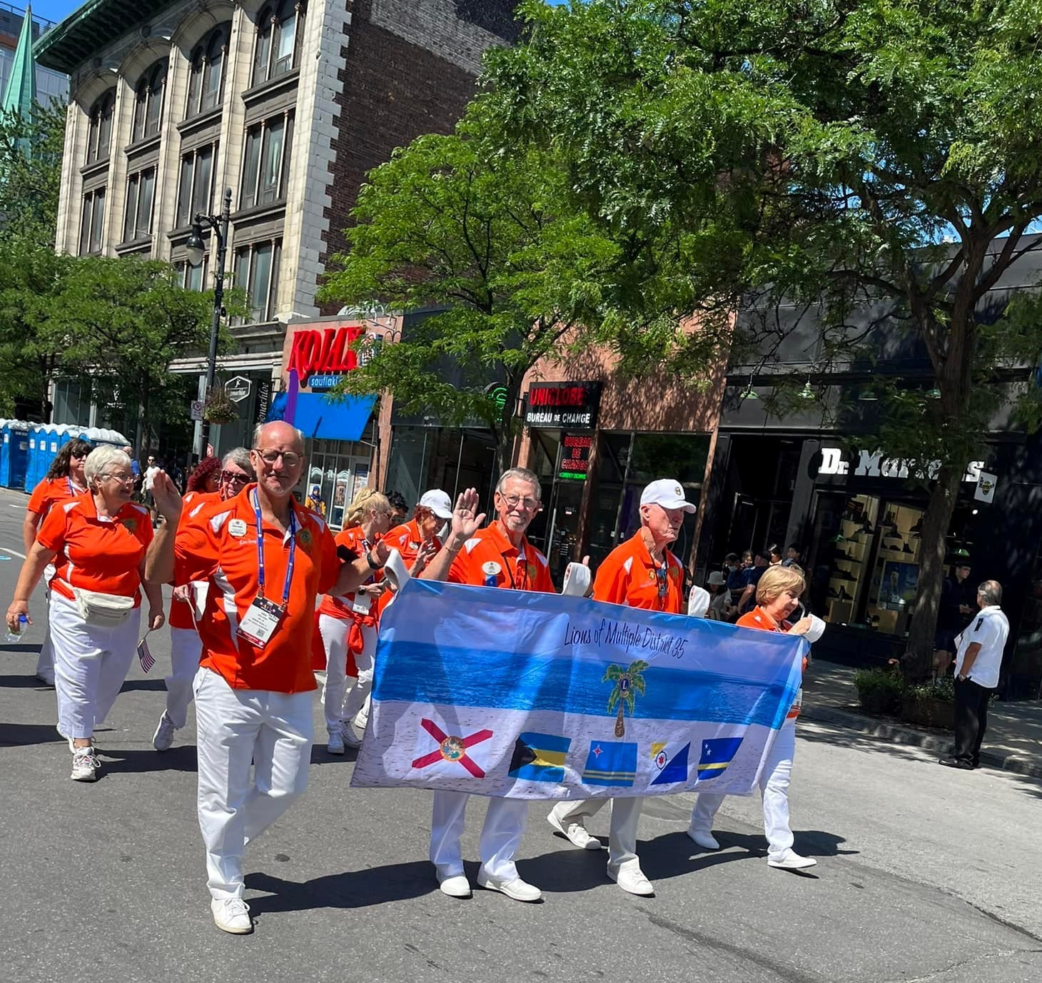 Lion President Greg Evans marches with the Multiple District Lions in the Lions parade through the streets of Montreal. Courtesy photo