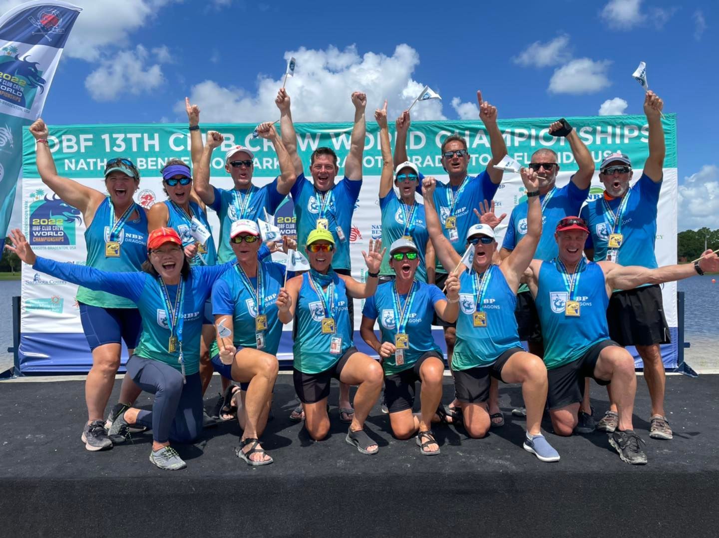 The NBP Dragons Senior B Mixed team (men and women) celebrates its gold in the 500 meters Short Boat Division. The gold was determined by aggregate time in three heat races. Photo courtesy Nathan Benderson Park Conservancy.