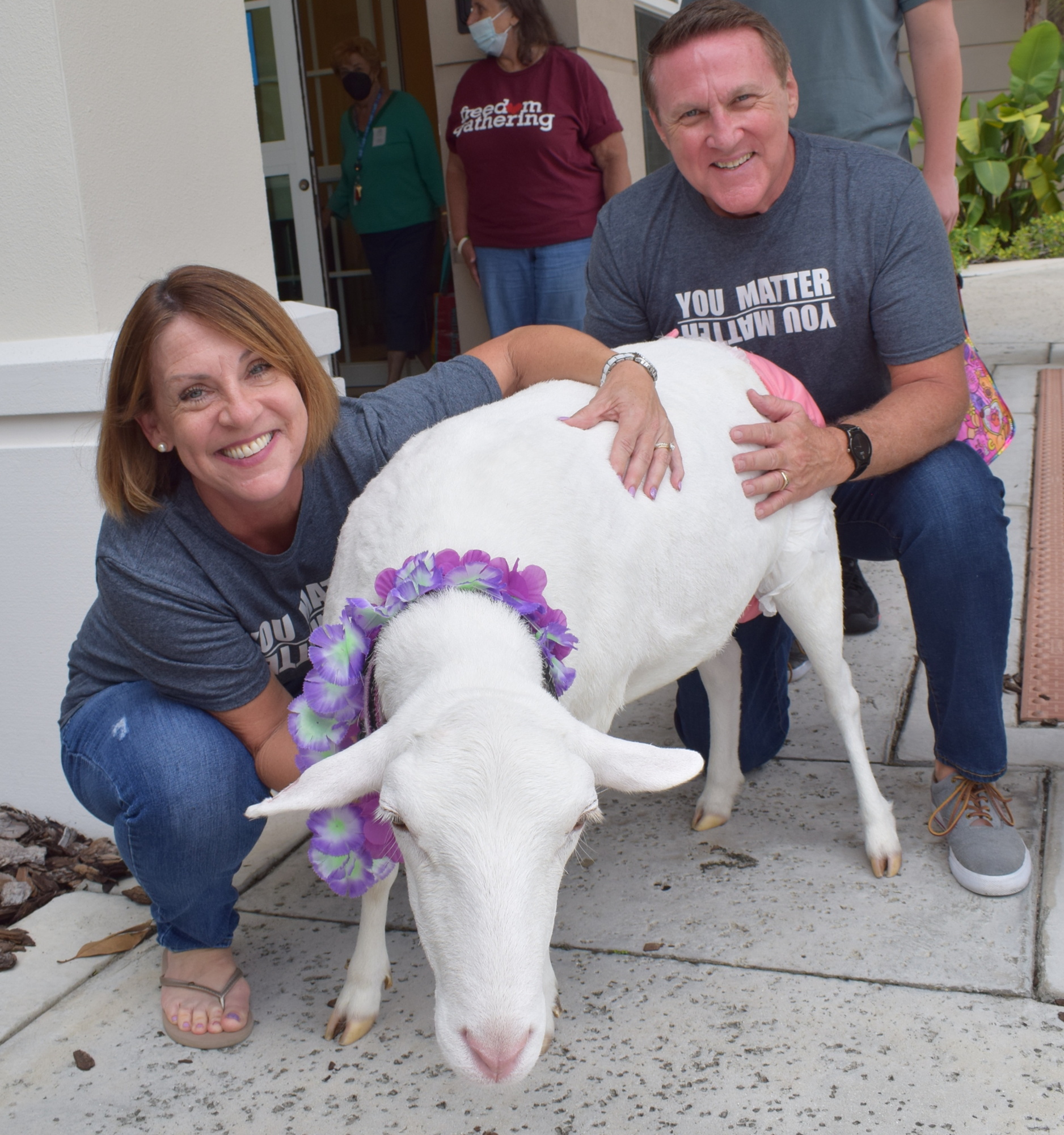 Vicki and Cliff Hofferbert of the Homebound Ministry of Woodland Community Church in Lakewood Ranch say Ivory brings unbelievable joy to all she meets. (Photo by Jay Heater)