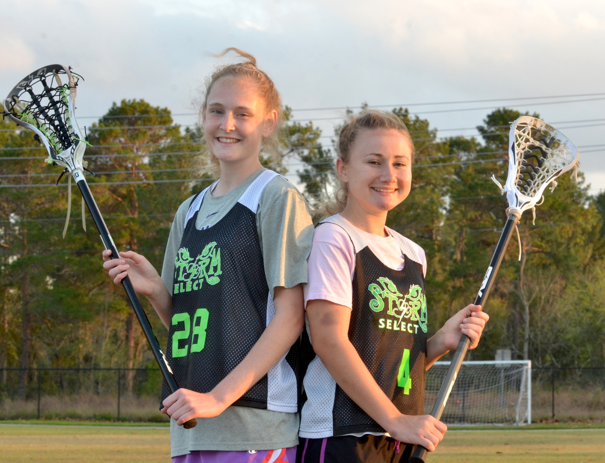 Elyse Decker, left, and Piper Johnson are teammates for Dr. Phillips and the Storm Select travel team.