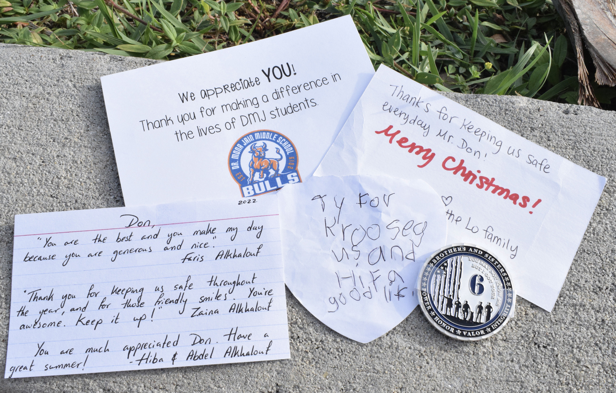 Indigo's Donald Karn, a crossing guard at the intersection of 44th Avenue East and Wood Fern Trail, has received dozens of notes and cards from students and families. (Photo by Liz Ramos)