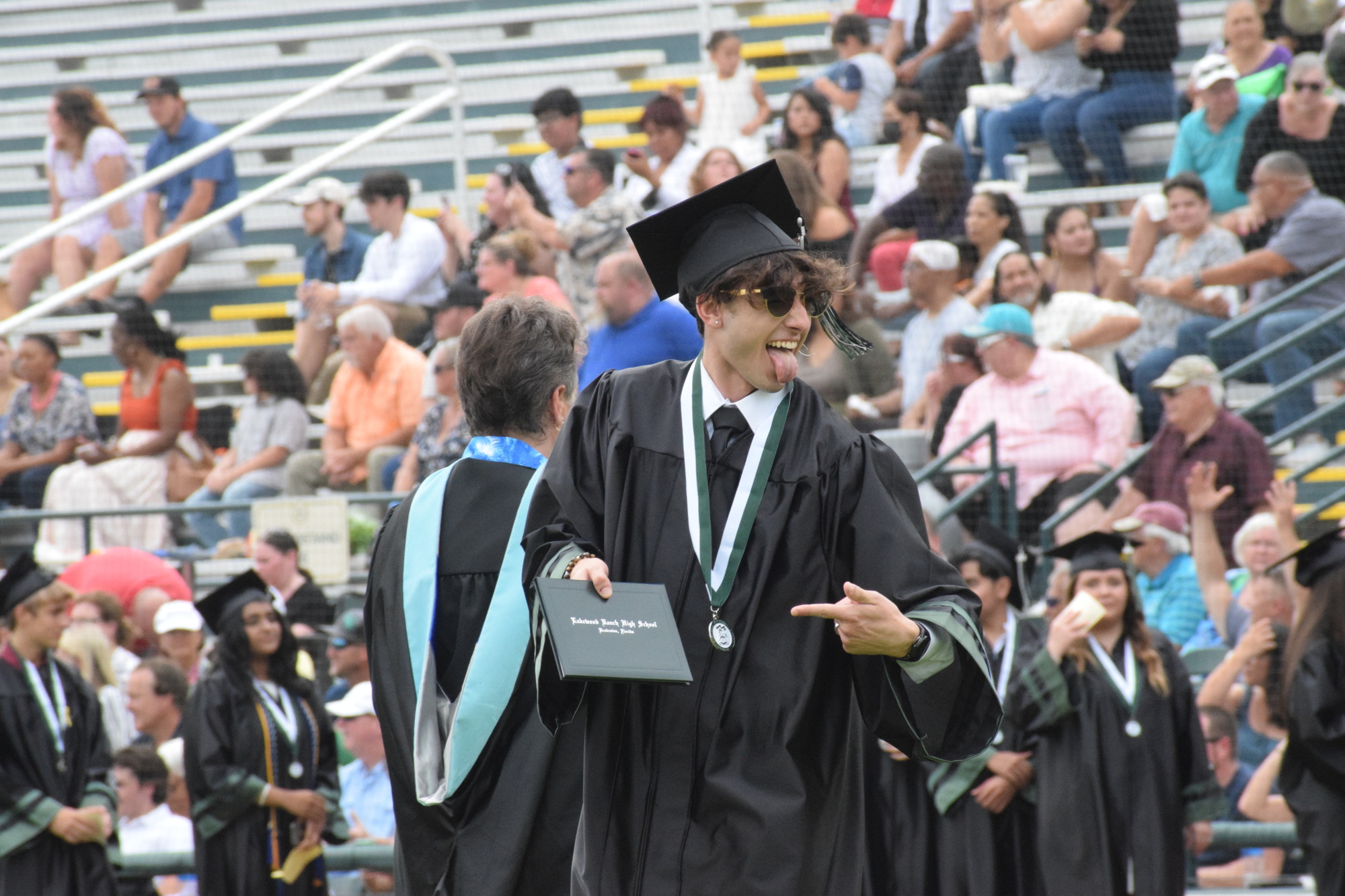 Lakewood Ranch High's Konstantino Papageorgiou Ayala shows off his diploma. (File photo)