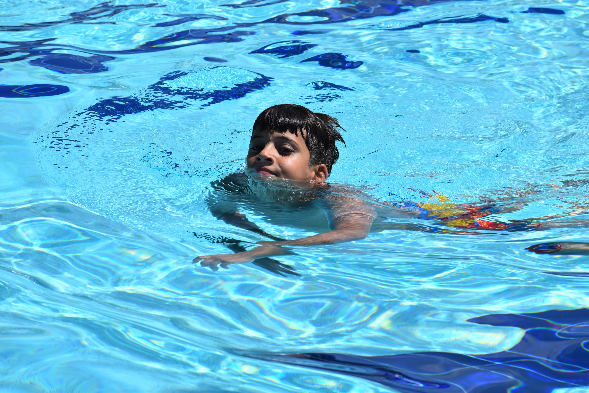 Bradenton's 8-year-old Yosaieo Leoon swims in the pool at GT Bray Park, which has 50-meter lanes. (Photo by Ian Swaby)
