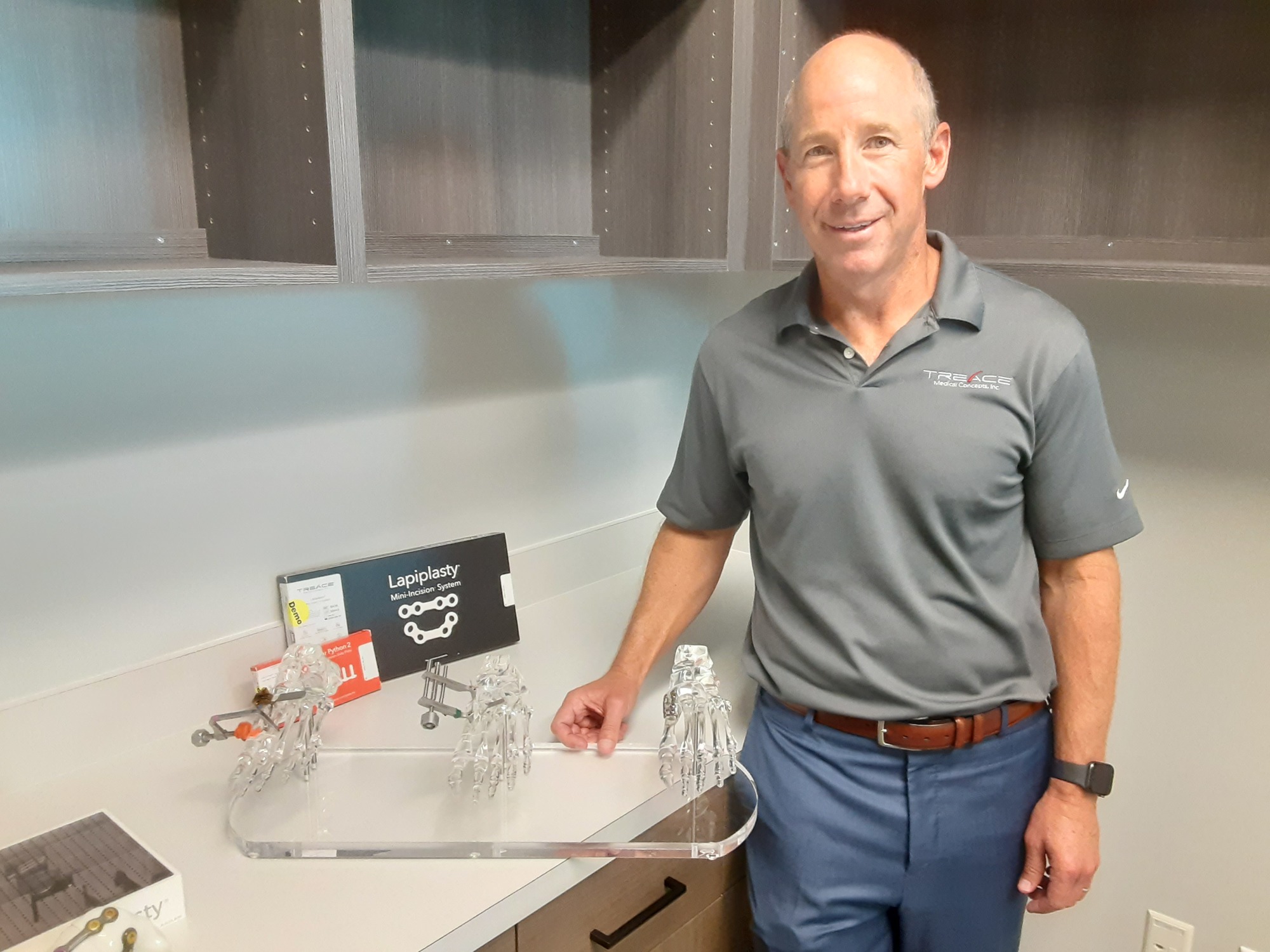 Treace Medical Concepts founder and CEO John Treace shows a demonstration model of his company’s surgical treatment for bunions. (Photo by Mark Basch)