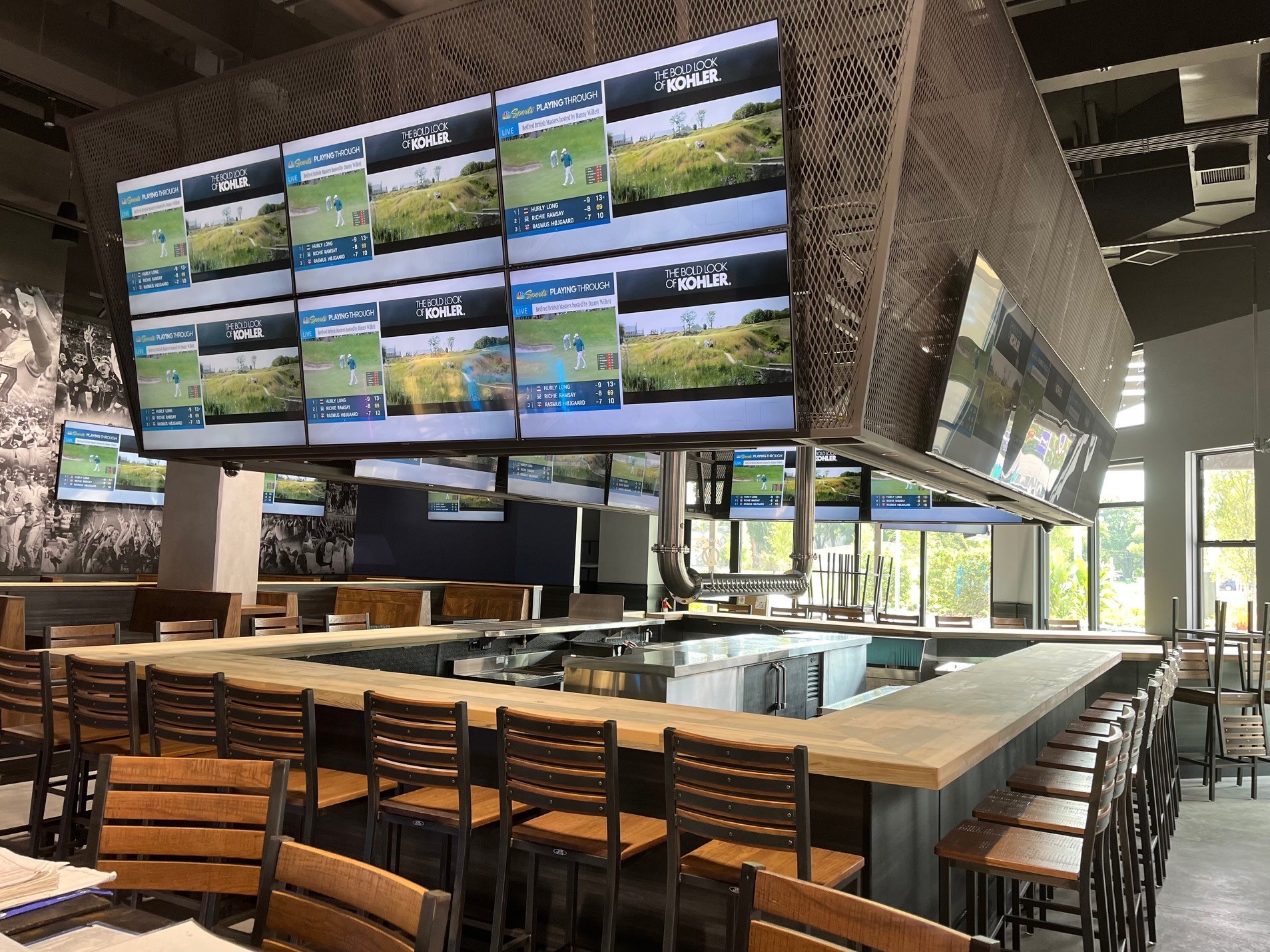 The bar area at Walk-On’s Sports Bistreaux in Tampa features a collection of TVs.  (Walk-On’s Sports Bistreaux)