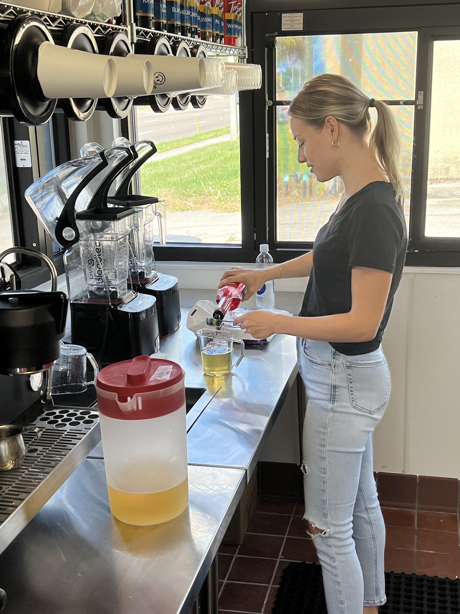 Manager Elizabeth Kokoshin prepares a beverage inside the   Smilies Coffee shop.