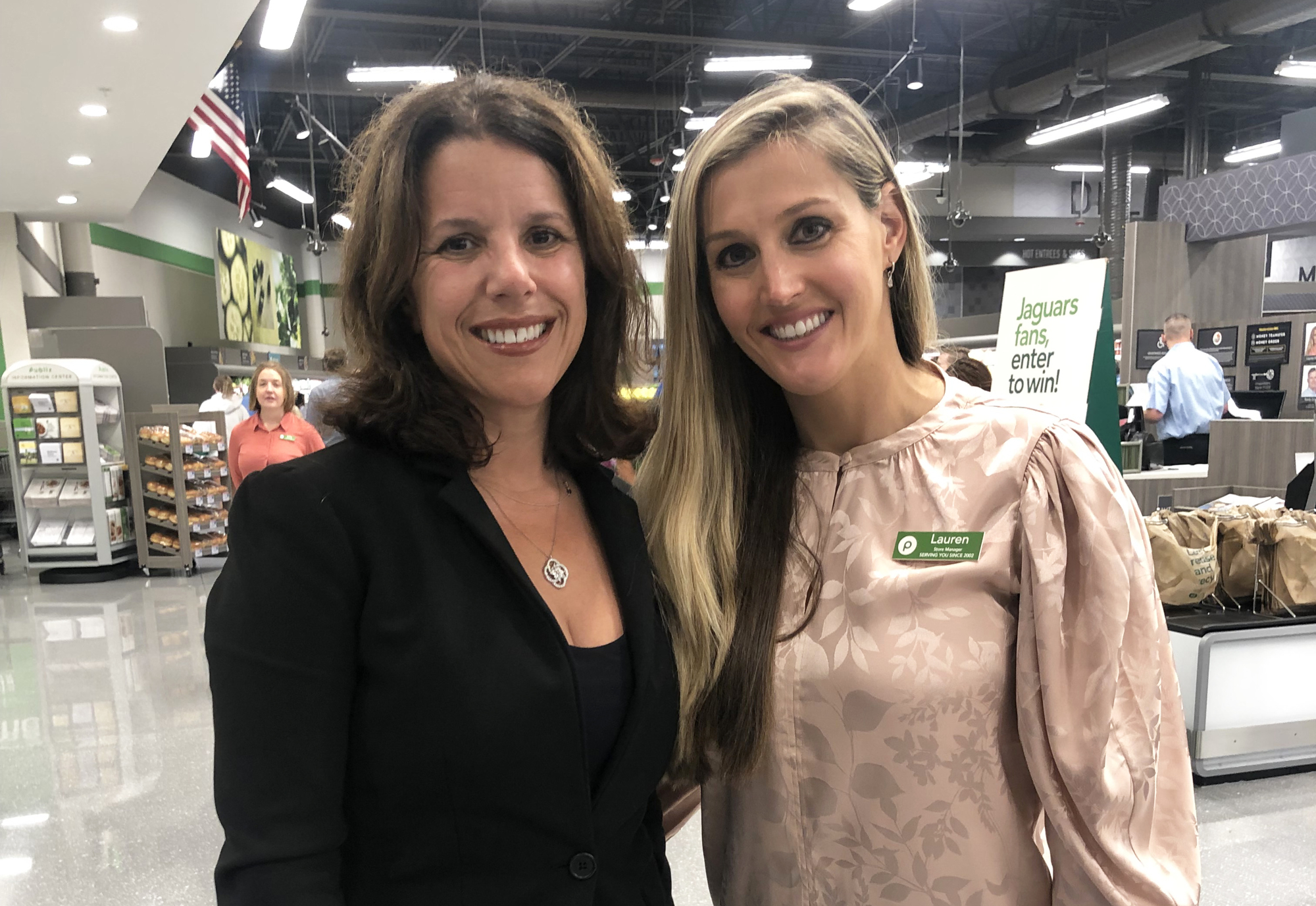 District 5 City Council member LeAnna Cumber and Publix Store Manager Lauren Hindery.