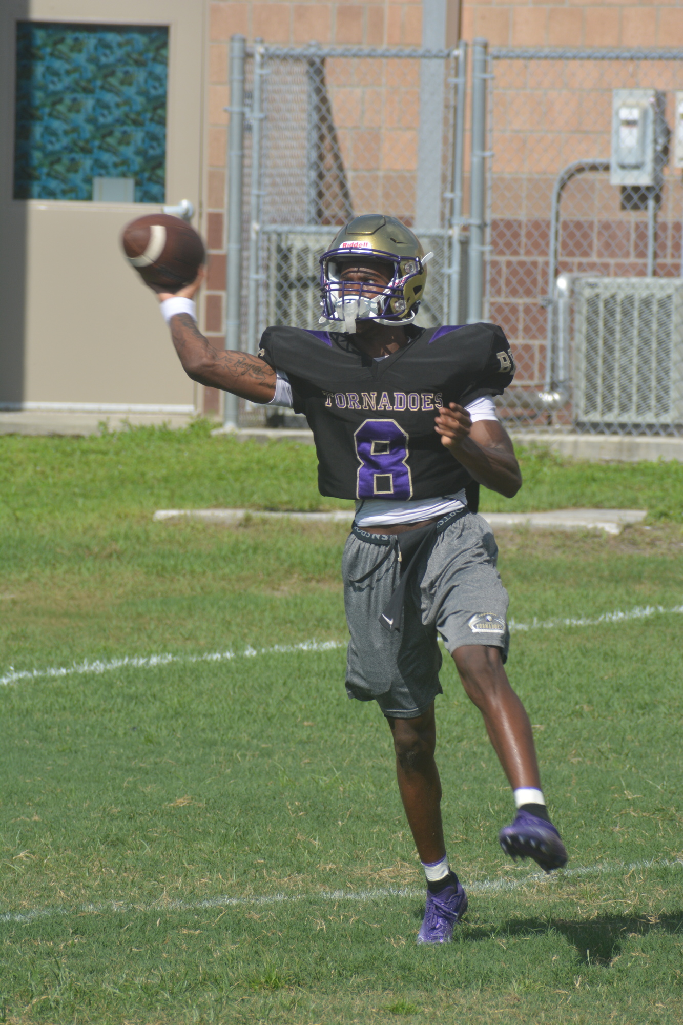 Booker quarterback Will Carter Jr., a senior transfer from Riverview High, can get it done with his arm and his legs. (Photo by Ryan Kohn)