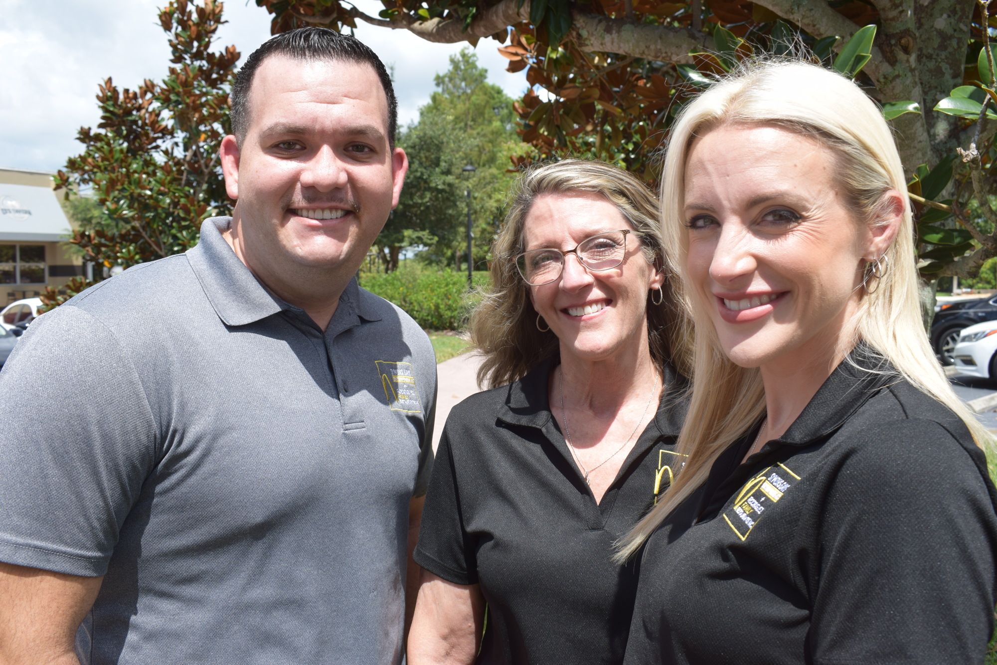 Sergio Rodriguez; his mother-in-law, Brenda Symons; and his wife, Amy Rodriguez, will open a new McDonald's franchise in Lakewood Ranch on University Parkway. (Photo by Jay Heater)
