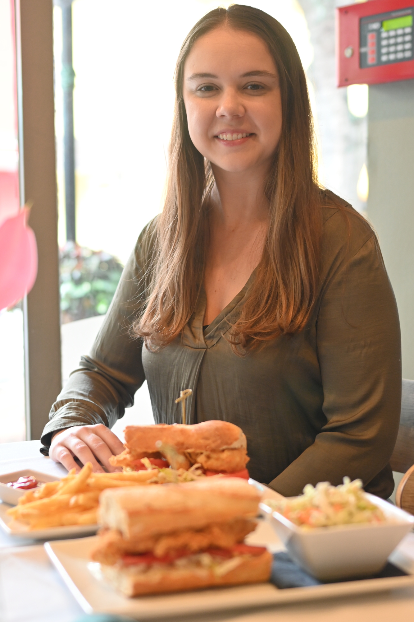 Duval's marketing manager Kelly Dungan says that the po'boy has become the restaurant's signature item. (Photo by Spencer Fordin)