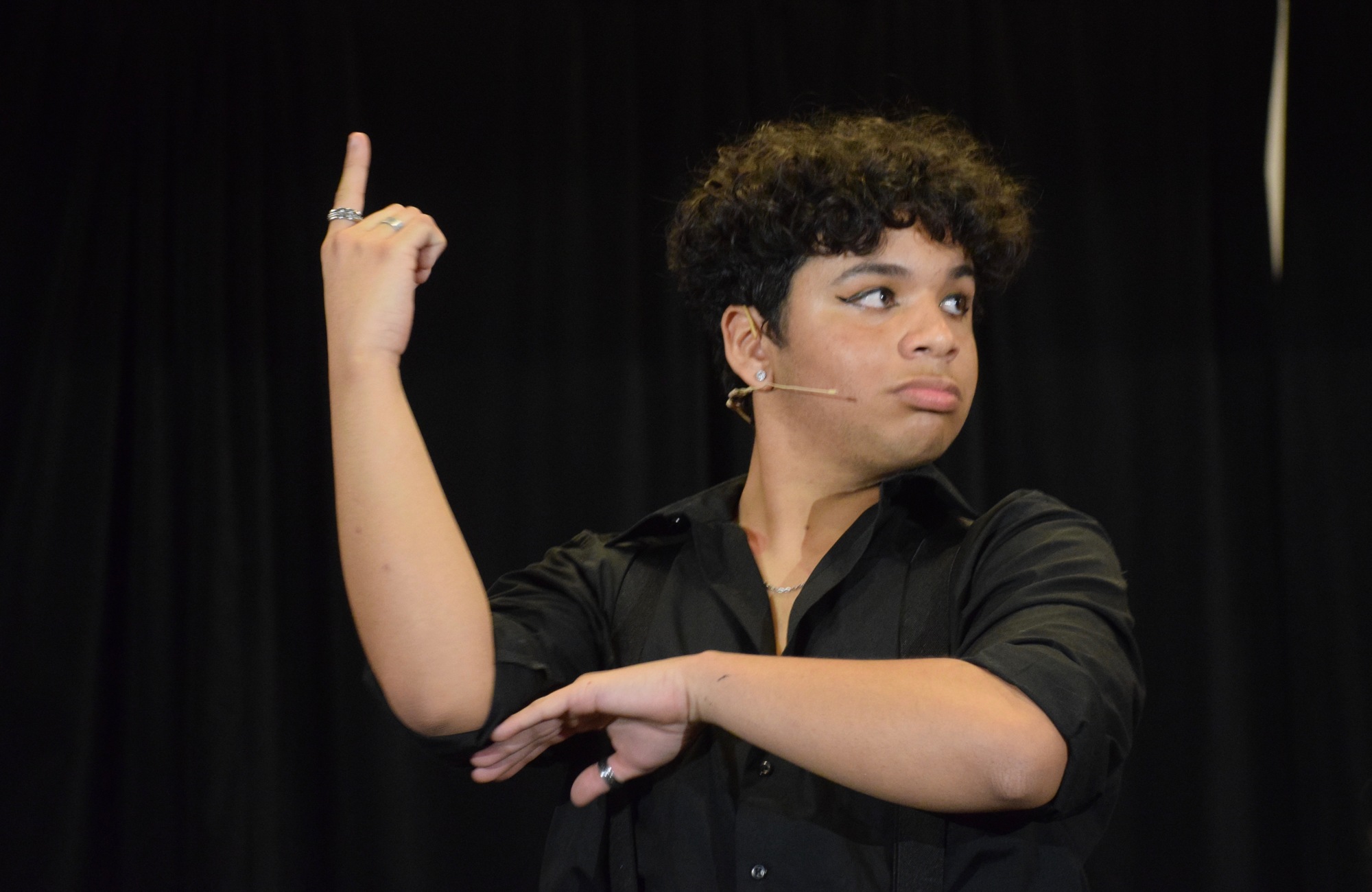 Braden River High School sophomore Ezekiel Lopez strikes a pose while performing songs from 