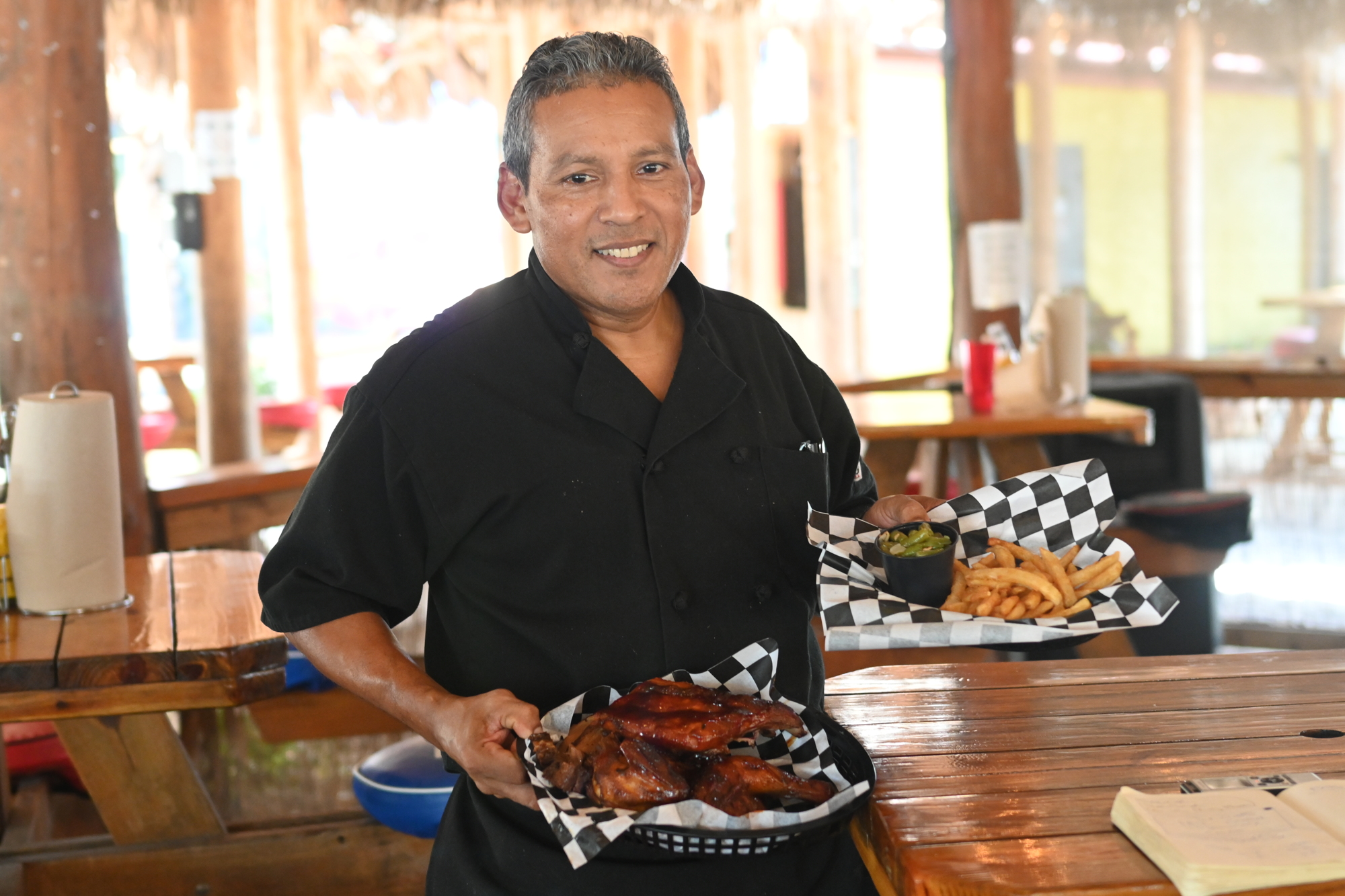 Kitchen manager Felix Morales says Stottlemyer's is cooking up to 40 pounds of brisket per night. (Photo by Spencer Fordin)