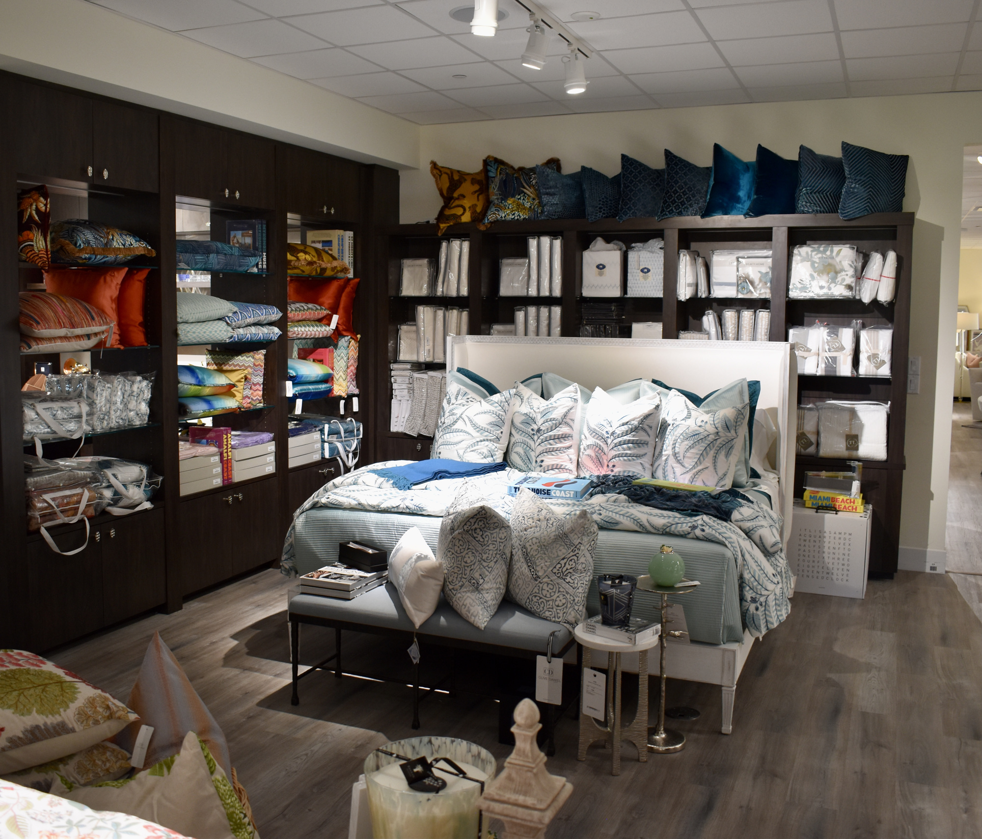 The Boutique portion of the showroom offers a selection of such items as linens, candles and other items. (Photo by Eric Garwood)