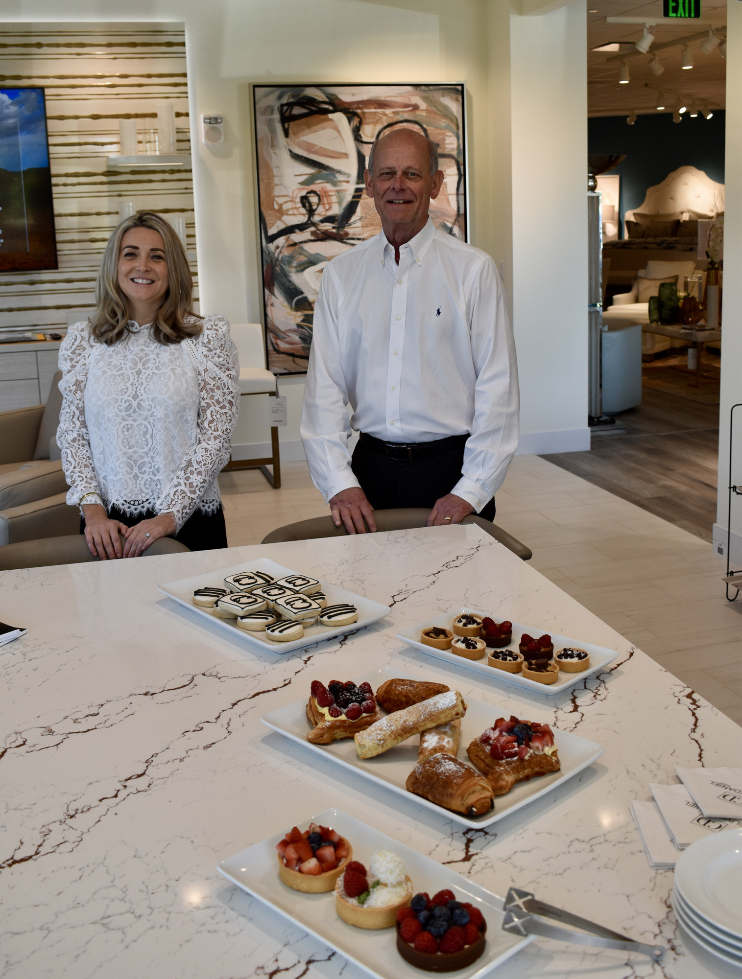 Sales Manager Shannon Gower and General Manager Rick Clary show off the store's cafe. (Photo by Eric Garwood)