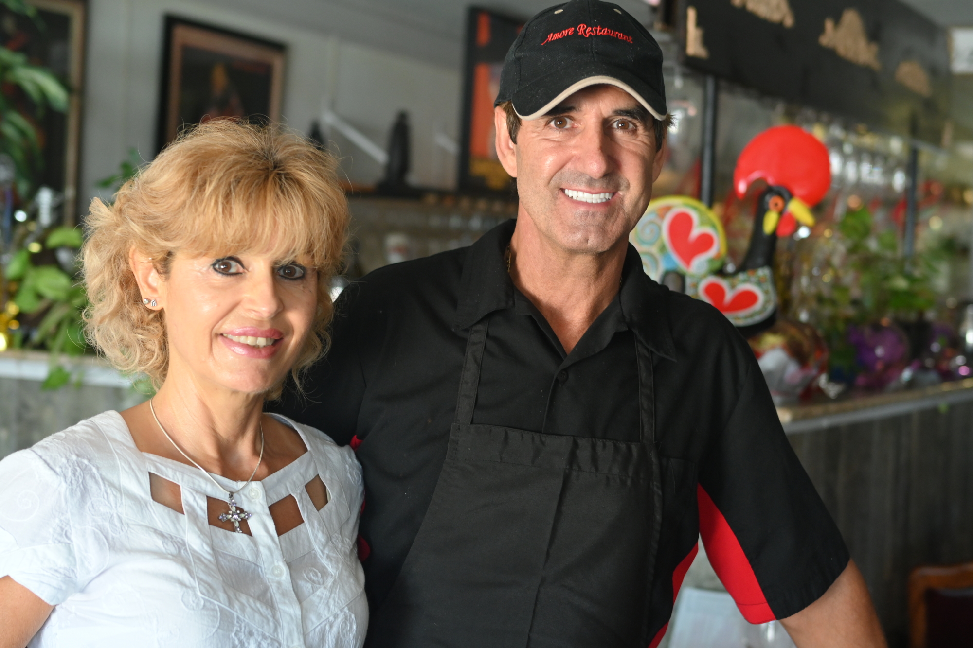 Liana and Tito Vitorino, owners of Amore Restaurant on Lime Ave. (Photo by Spencer Fordin)