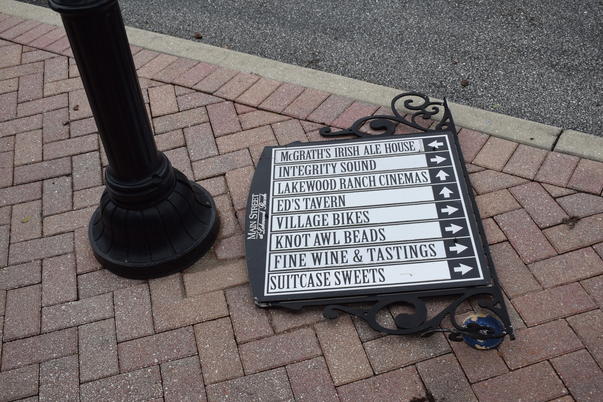 Signs all over Lakewood Ranch ended up on the ground after Hurricane Ian.  (Photo by Jay Heater)