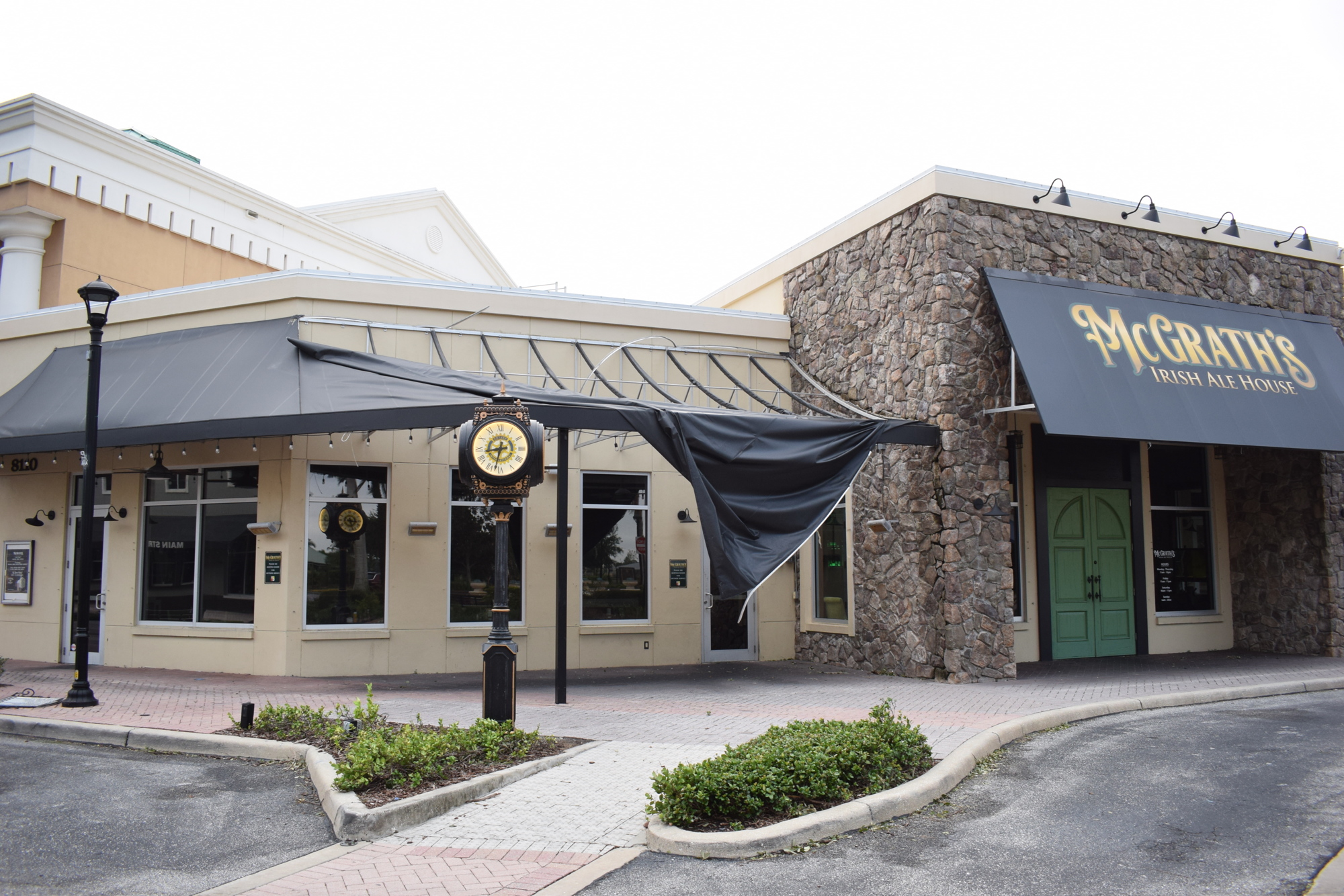 McGrath's Irish Ale House at Main Street at Lakewood Ranch lost its awning in the storm. The rest of the street suffered only minor damage. (Photo by Jay Heater)