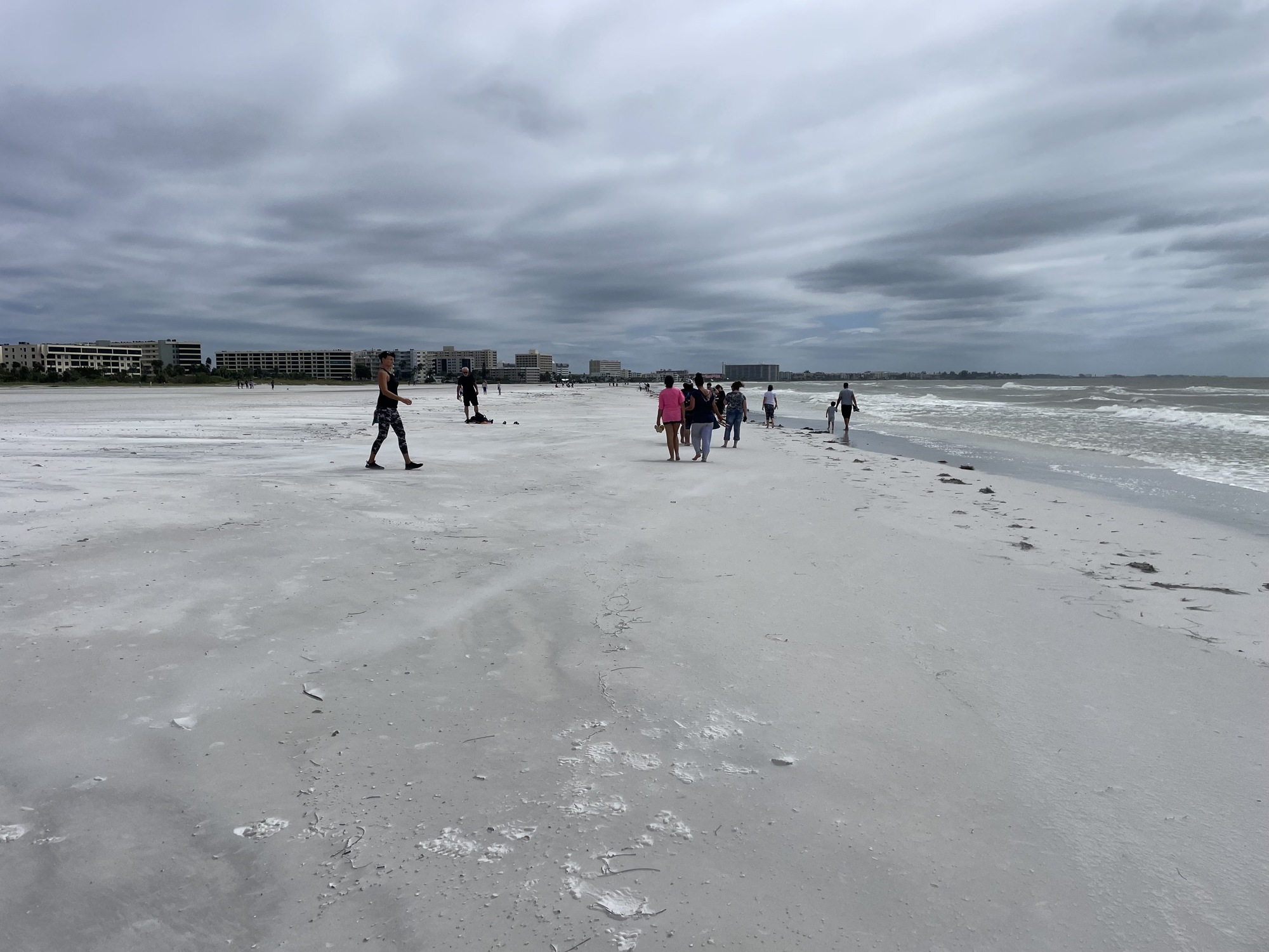 Minor damage was seen early afternoon Thursday on Siesta Beach as some residents walked the beach. (Photo by Ryan Kohn)