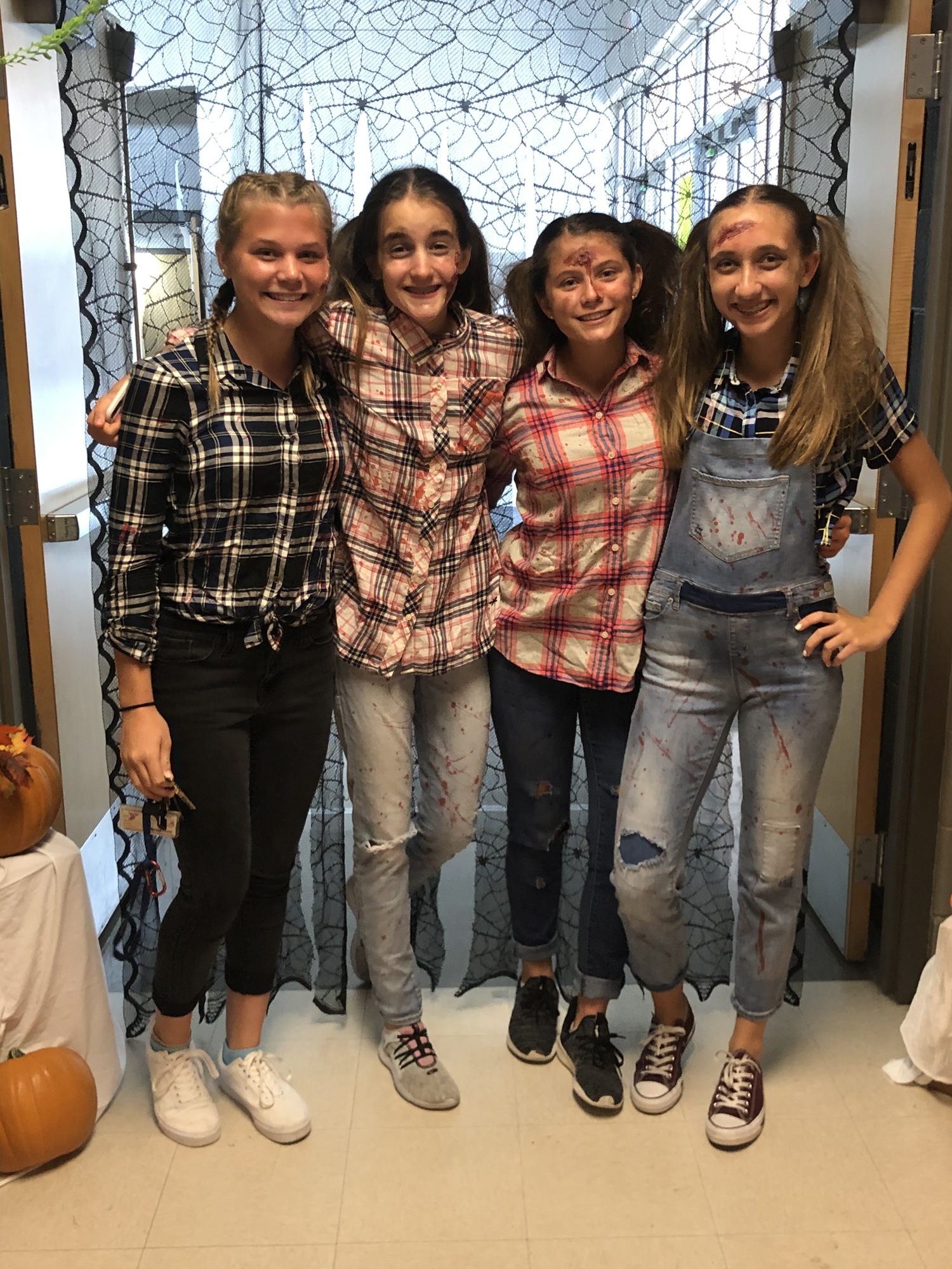 Former Nolan Middle School students Amy Zona, Olivia Sharkoski, Sara Zona and Alexa Tzelepis are ready to scare people at the school's haunted house in 2019. (Courtesy photo)