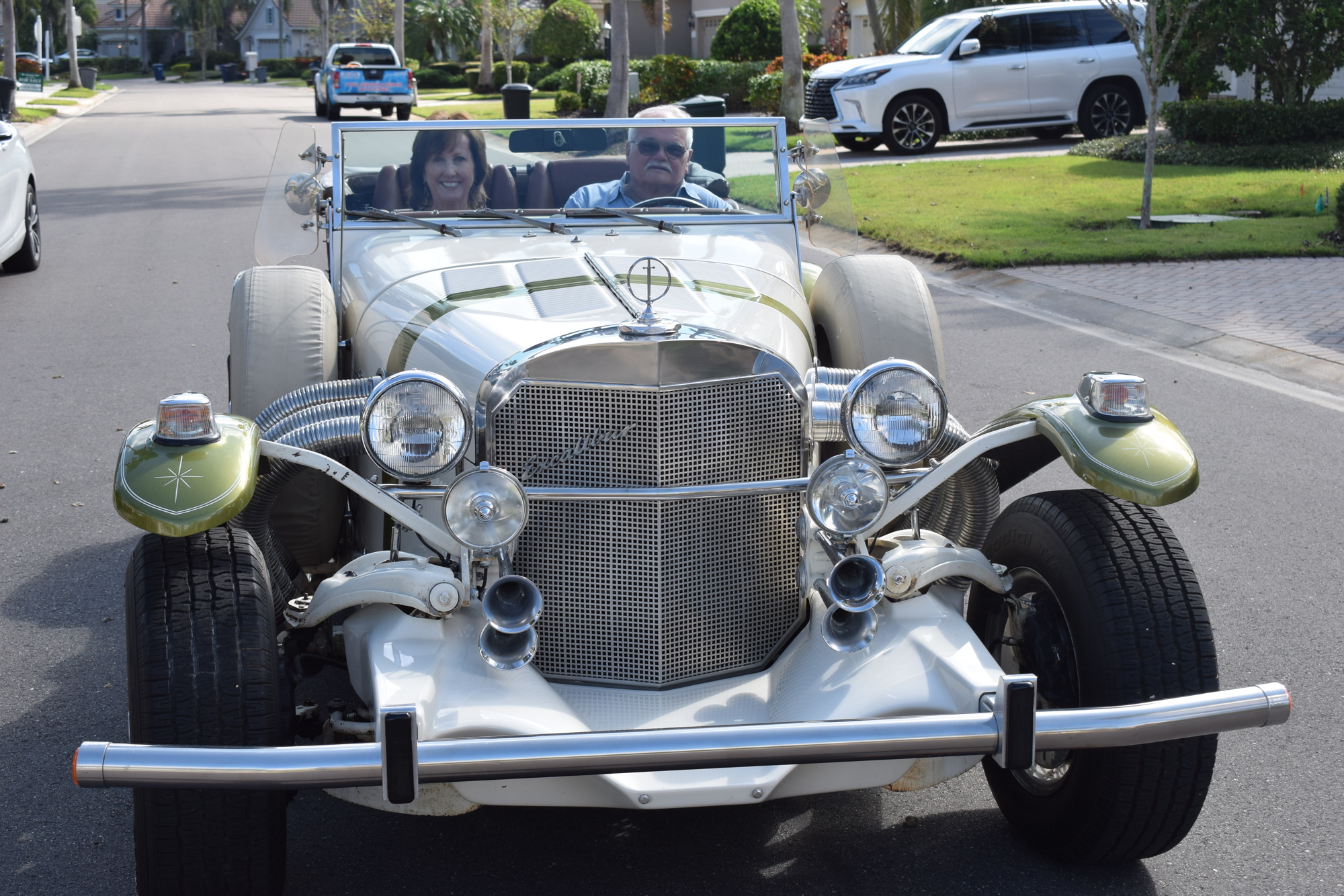 Lakewood Ranch car show features an Excalibur packed with family