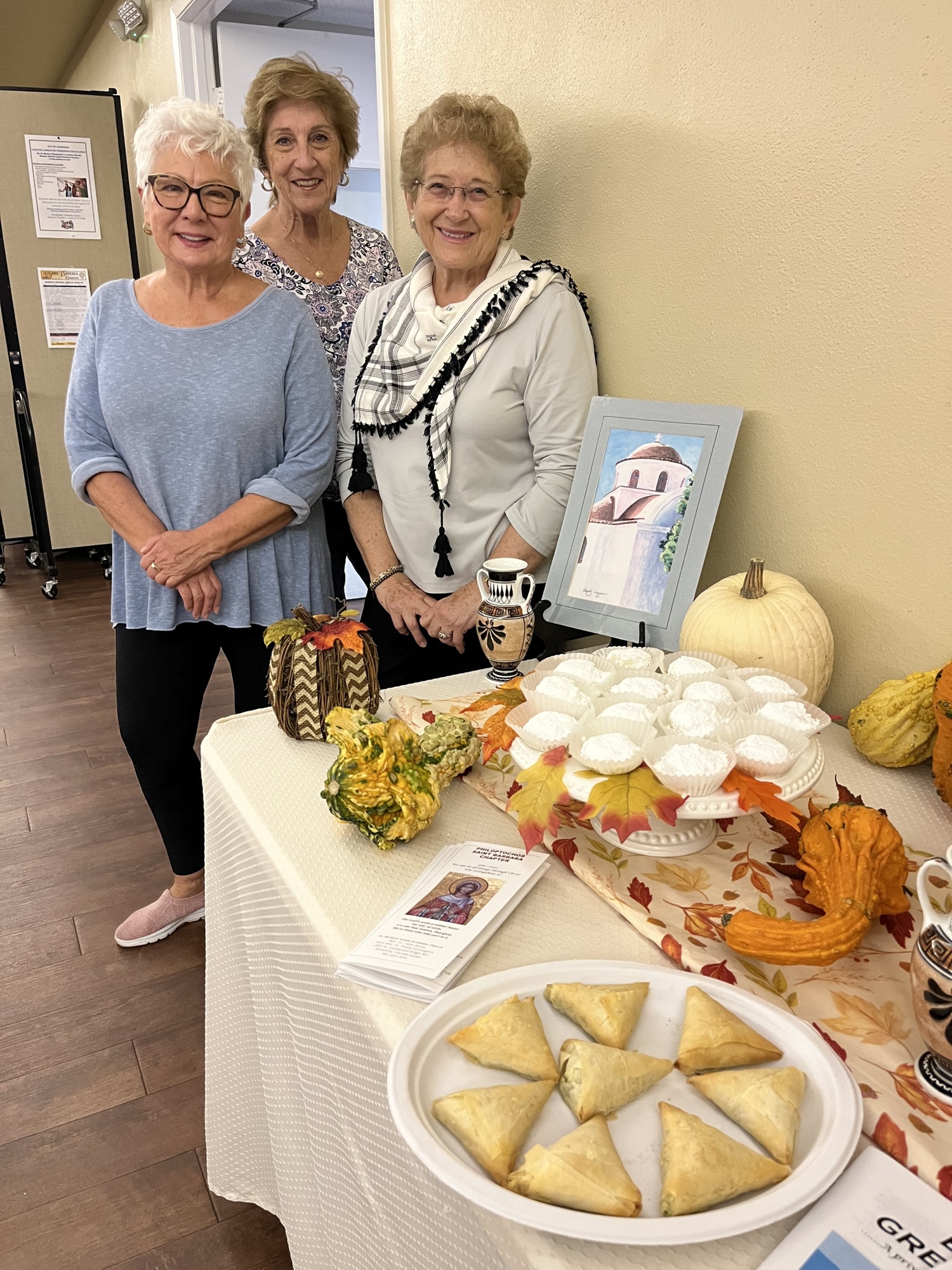 Marilyn Blazakis, the president of the St. Barbara Philoptochos Society, Pat Trempelas, the assistant treasurer, and Maria Kirlangitis, the vice president, can't wait to serve Greek foods and pastries at Autumn Fest.