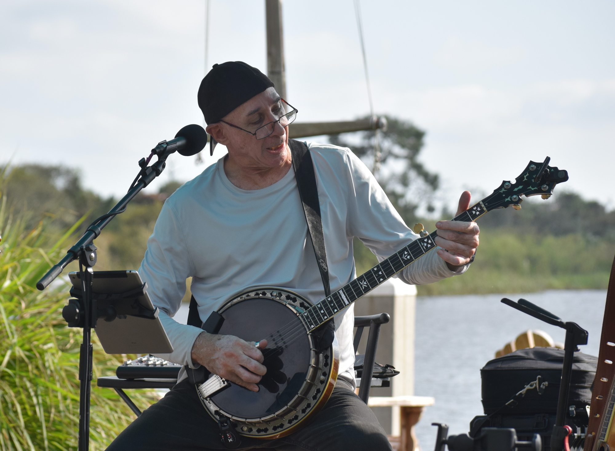 Hal Meyers fires up his banjo at Jiggs Landing. (Photo by Jay Heater)