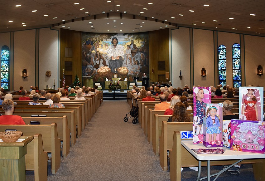Toys for Catholic Charities donated at concert - Vimarsana News